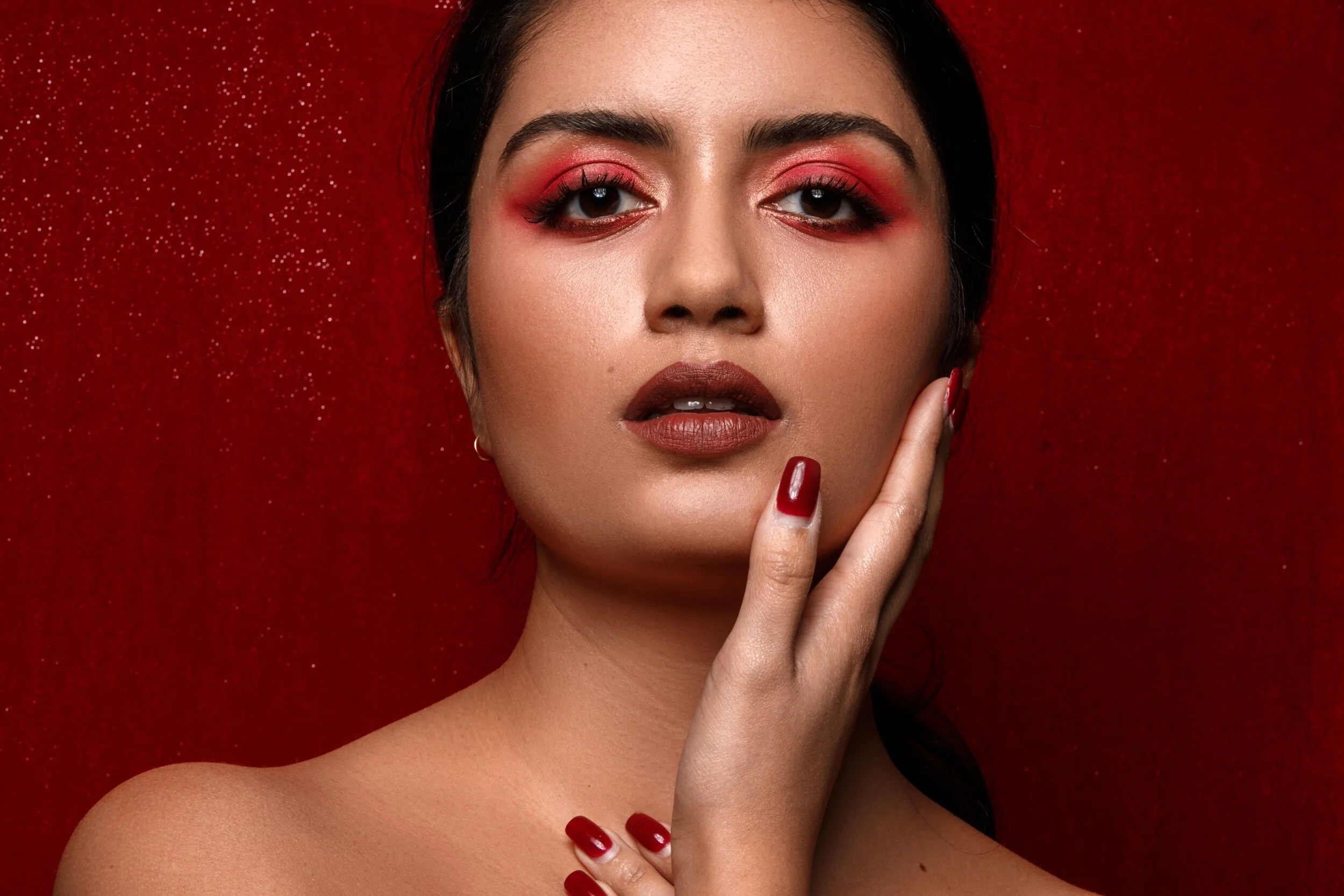 red eyeshadows bright color  brown skin makeup for photoshoot