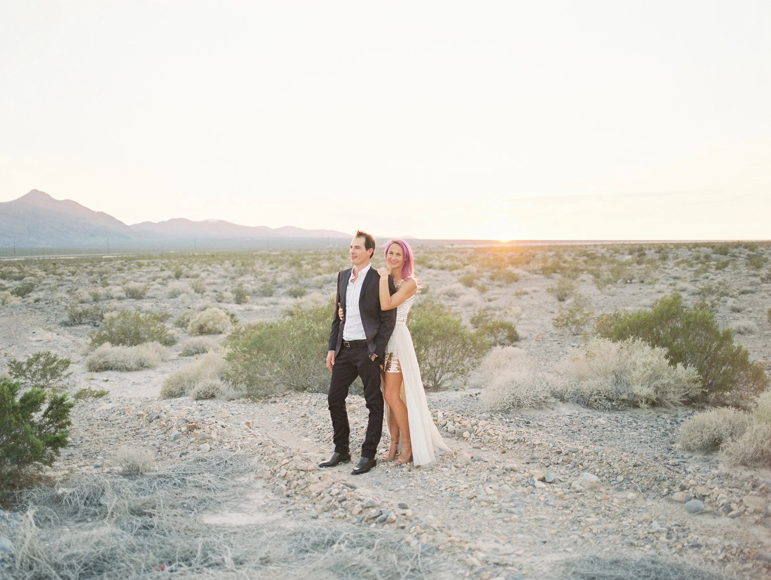 Jacq and Chris taking in the beautiful landscape during their desert elopement.