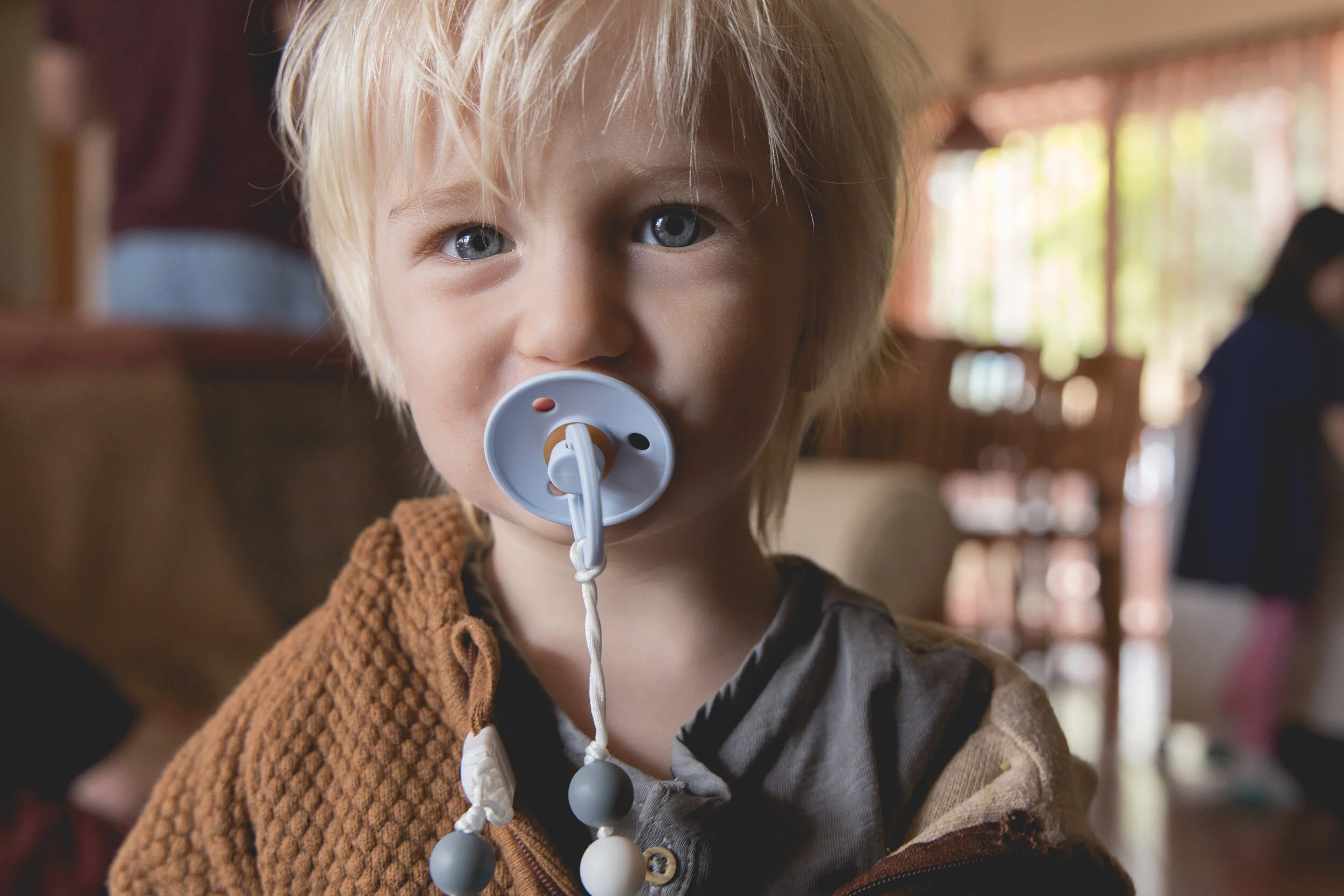 toddler with a pacifier 