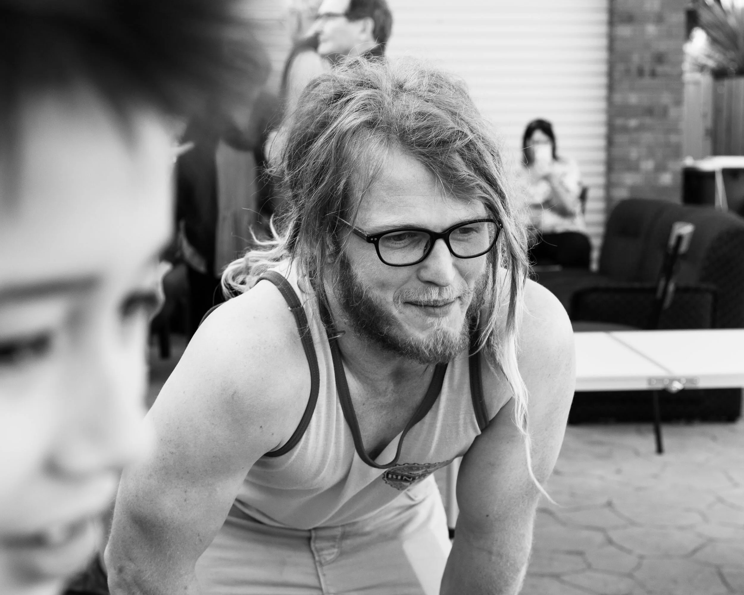 black and white photo of a man catching his breath