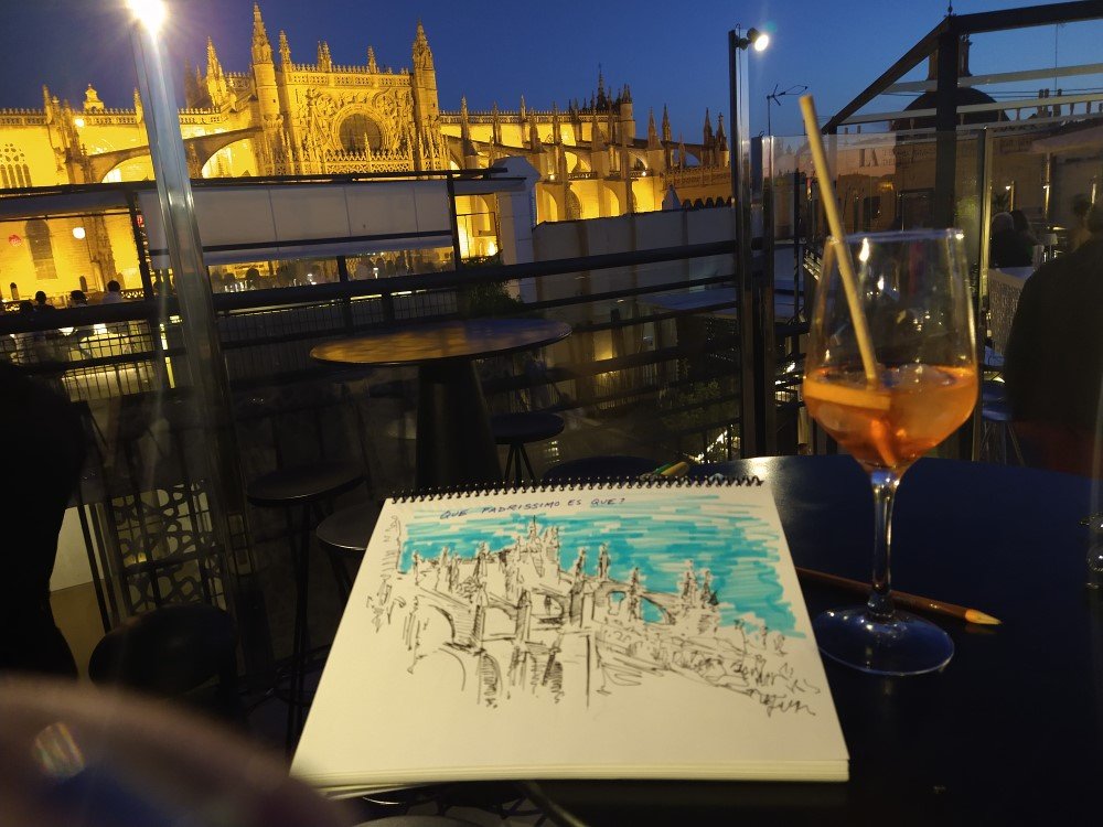  Drinks and drawing at a rooftop bar. 