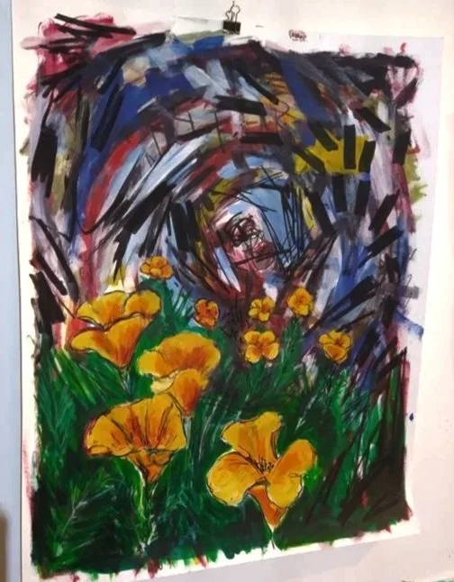 Blooming orange California poppy flowers in front of a black, blue, and red gloomy spiral