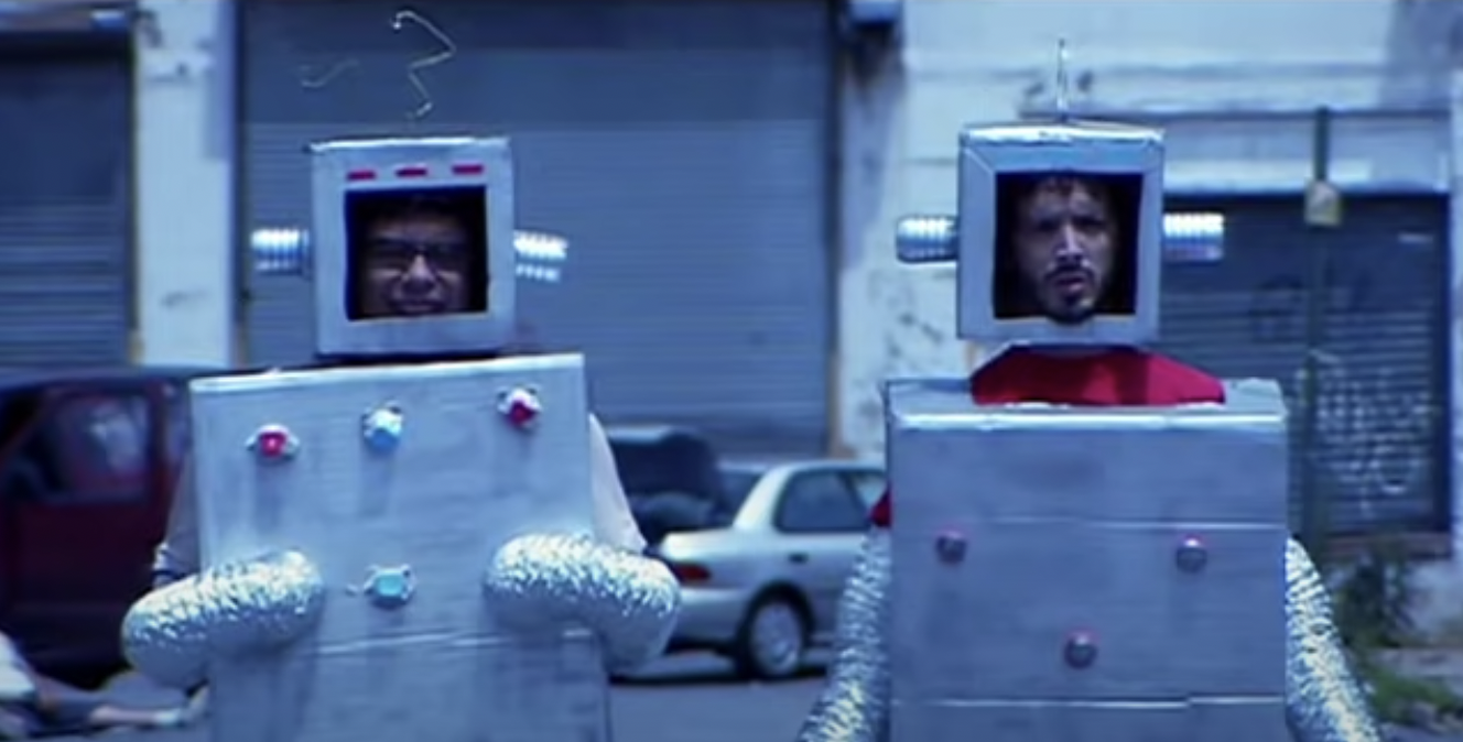 Image from Flight of the Conchords TV series, two characters dressed as robots