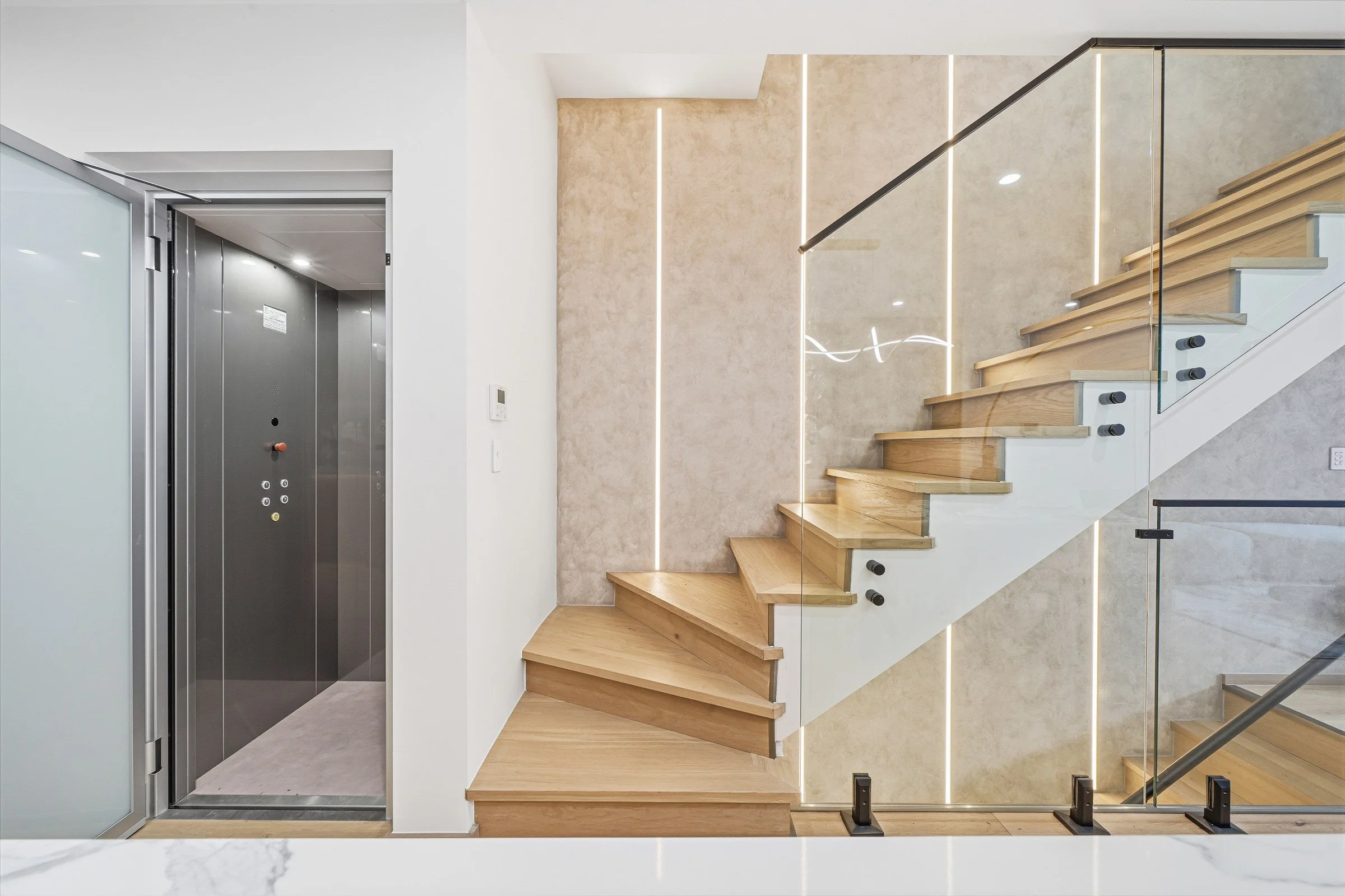 10-lift-and-timber-stair.jpg