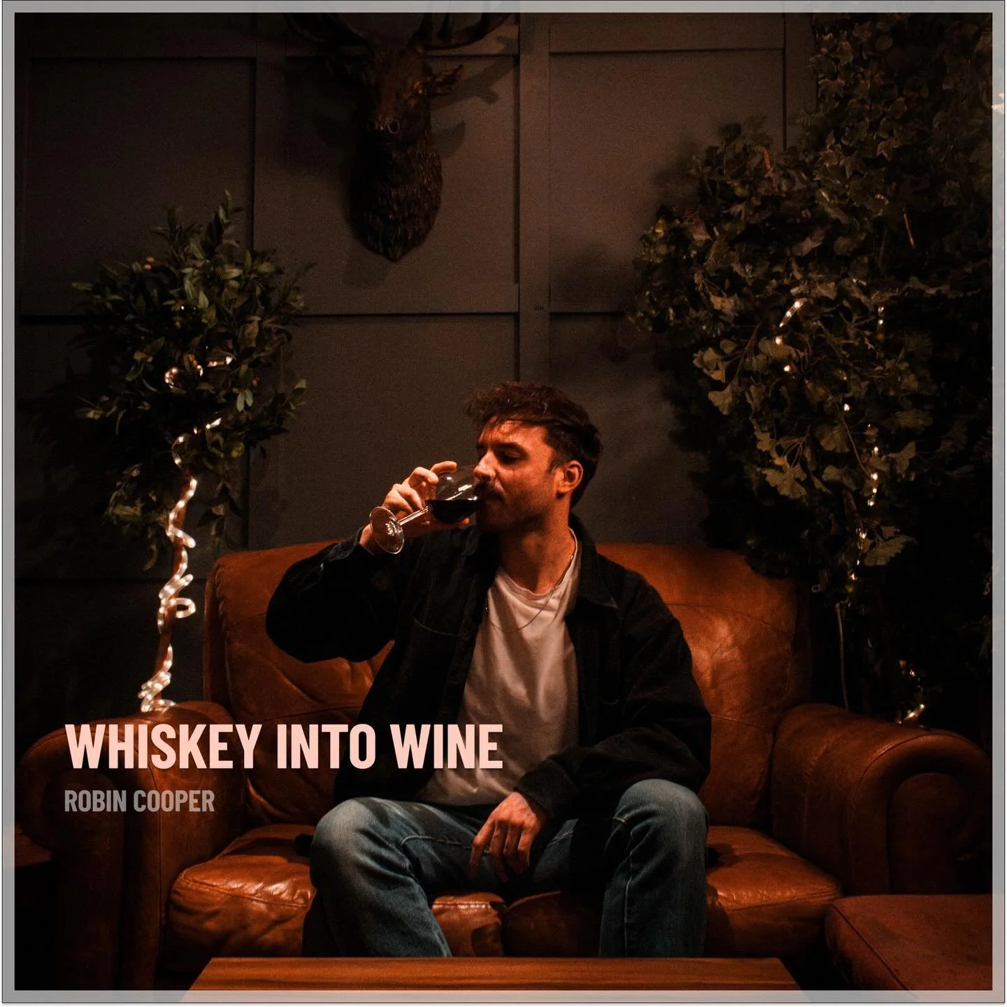 Robin Cooper - Whiskey Into Wine. Released Friday 28th November 2025. 

Blending British Indie with Contemporary country, Robin Cooper is an artist whose heart very much belongs to both Leeds and Nashville

Whiskey Into Wine is a pure feel-good song.