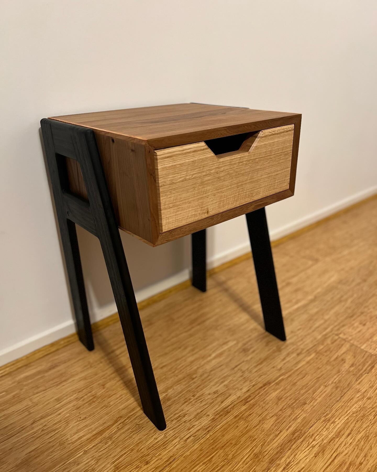 This prototype was made in a weekend. It&rsquo;s a simple nightstand with a single draw and some striking legs. Experimented with India ink to blacken the legs and it worked really well. The English Elm carcass produces a beautiful contrast to the Ma