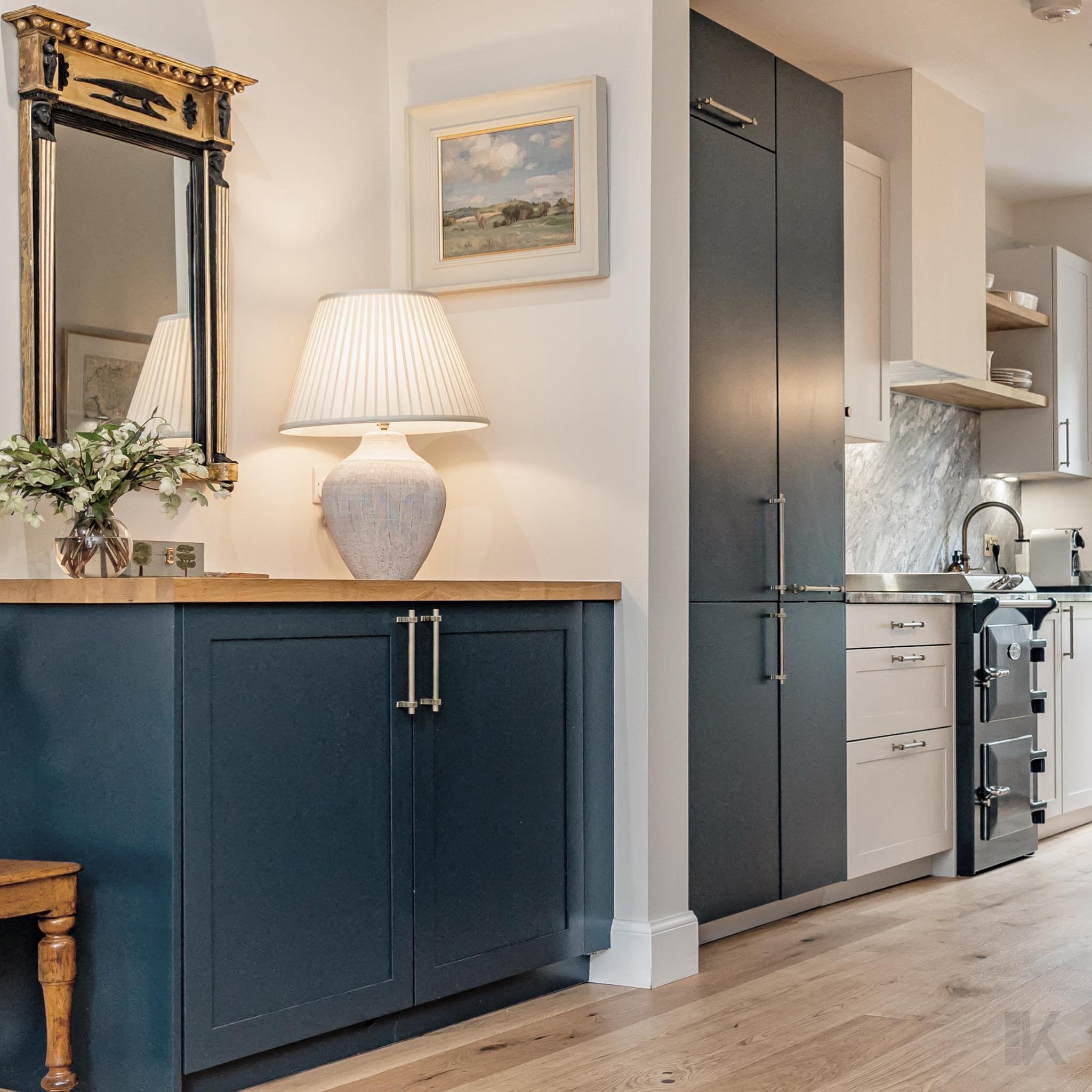 A recently completed traditional classic.

Cabinetry: Bespoke RAL colour lacquered finish 
Work surfaces: 30mm Sant Angelo Sensa Granite 
Cooker: Everhot 60 - Marine Blue
Tap: Quooker patinated brass
Handles: Ambrose Bronze (bar) ⠀⠀⠀⠀⠀⠀⠀⠀⠀⠀⠀⠀ ⠀⠀⠀⠀⠀⠀⠀