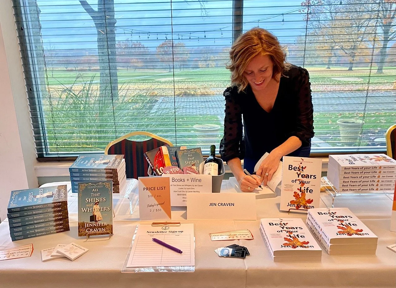 Author Jen Craven signing copies of her book, Best Years of Your Life