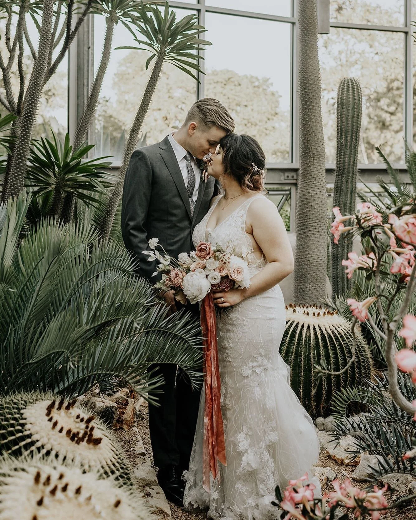 A greenhouse love story. 🌵🤍
⠀⠀⠀⠀⠀⠀⠀⠀⠀
*
*
*
⠀⠀⠀⠀⠀⠀⠀⠀⠀
⠀⠀⠀⠀⠀⠀⠀⠀⠀
⠀⠀⠀⠀⠀⠀⠀⠀⠀
Photographer: @mapandcompassphoto 
Venue: @thegreenhouse_driftwood 
Video: @moonlitweddings 
Floral: @clementine.botanical.art 
DJ: @dartcollective 
Makeup: @hannahzahnerbeau