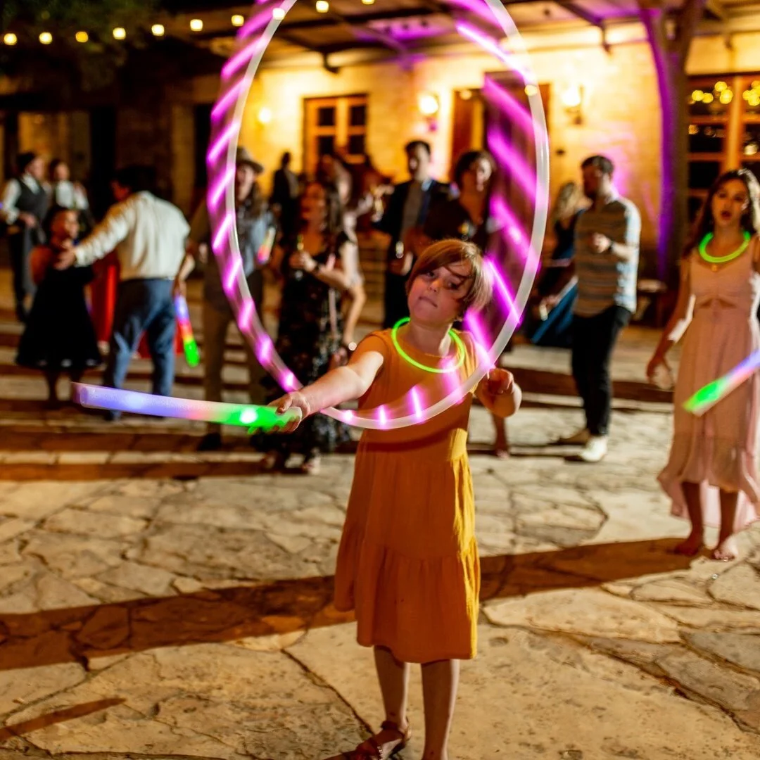 This is what happens when the hula hoops come out! (Swipe left to see more of the fun.)
.
Venue: @wildflowercenter
Photography: @mistymclendonphoto
Hair &amp; Makeup: @beautymarkaustin
Floral: @thebloombartx
Lighting: @austineventlighting
Stationery: