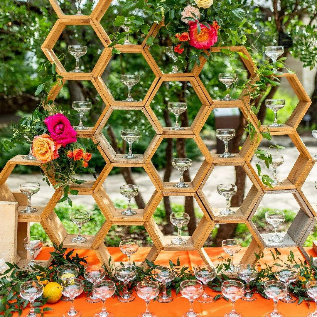 Coming up with new and inventive ways to blend the creative with the practical is what we do.
.
When it comes to design, we consider each detail important as it comes together to tell a story. Combining height, color, and texture to create a champagn