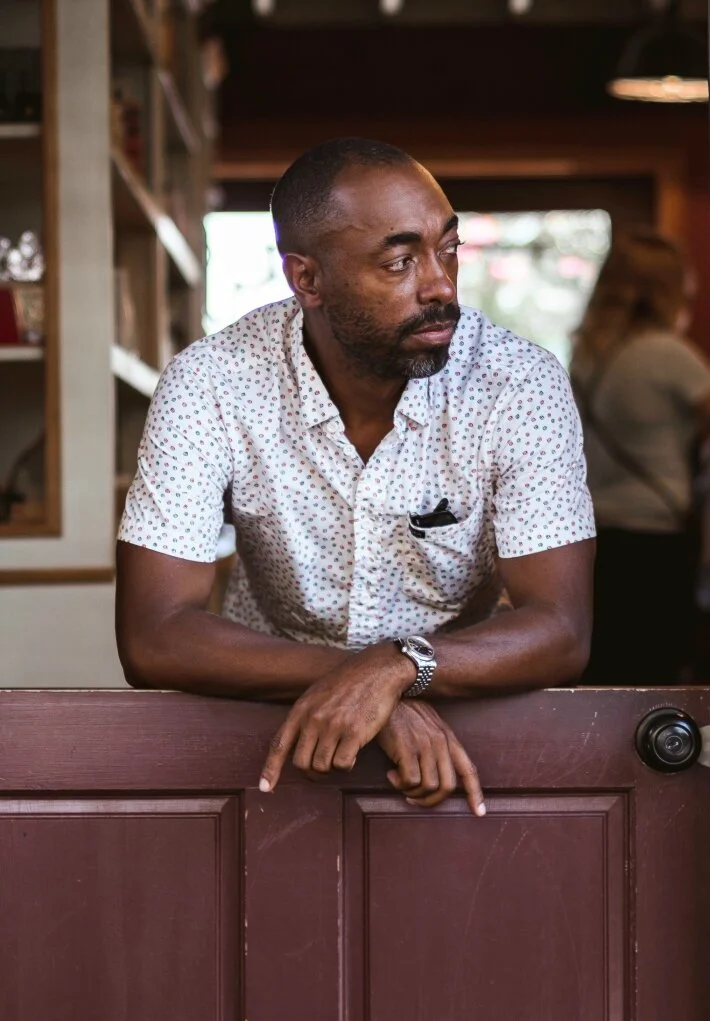 Woody Lovell looking out door