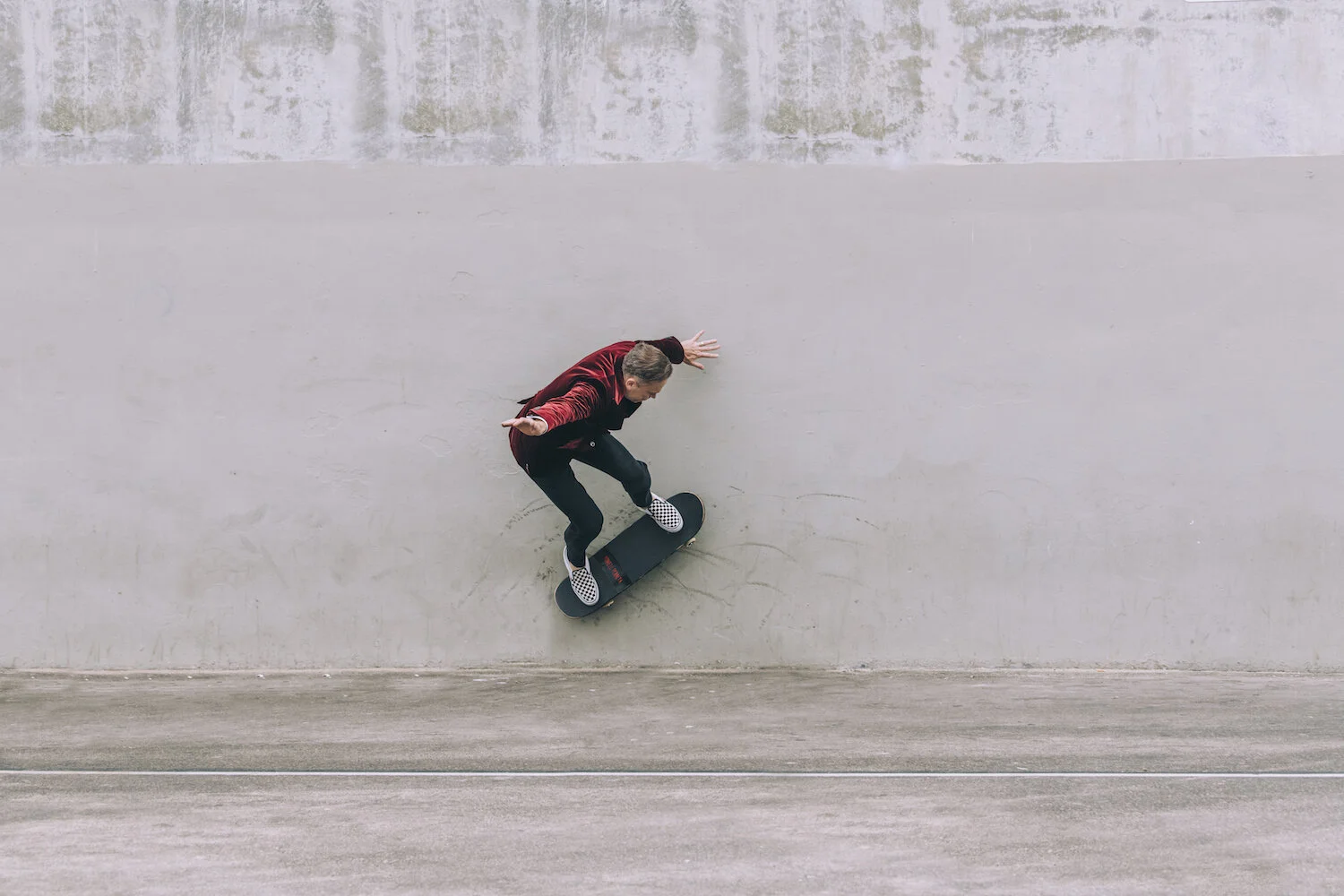Dr. Jon Marashi Skating on concrete wall