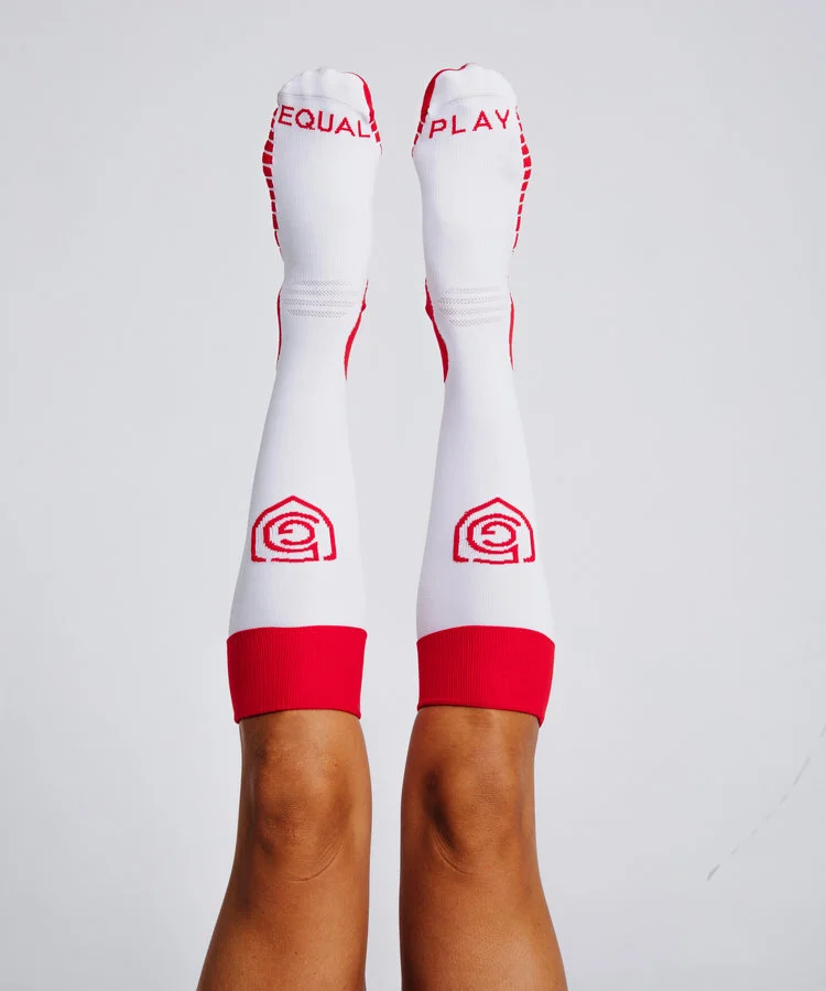 White soccer socks in front of white background