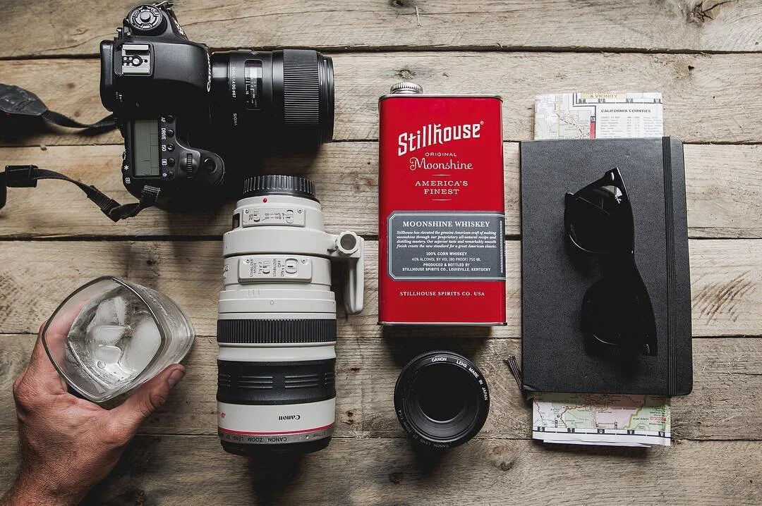 Stillhouse can with camera and lens 