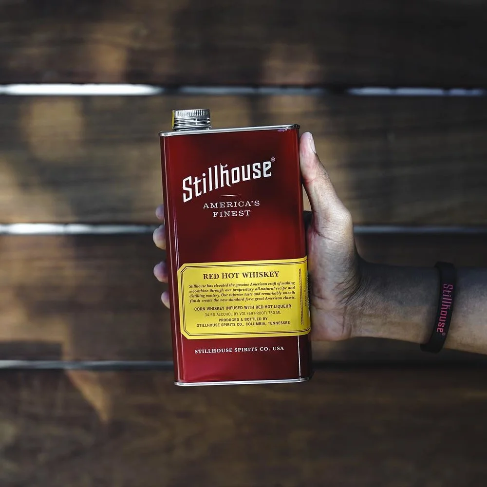 Close up of Stillhouse can in hand
