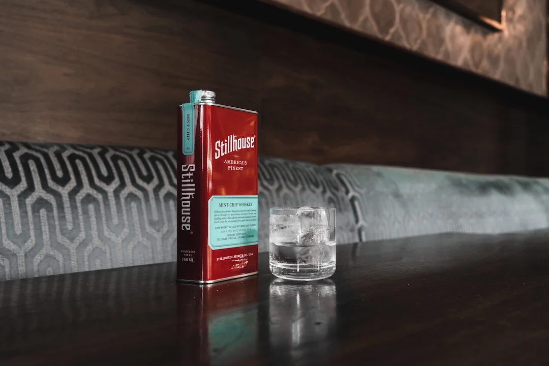 Close up of Stillhouse can and glass