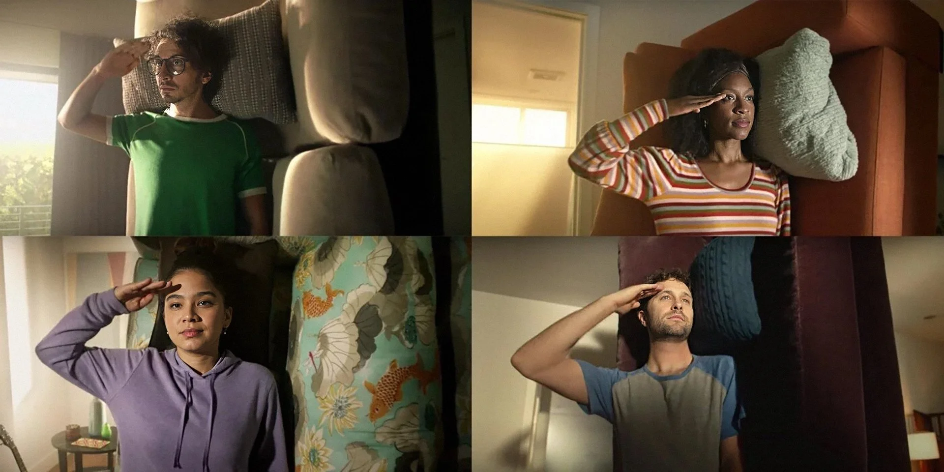 4 people laying on their couches with a salute