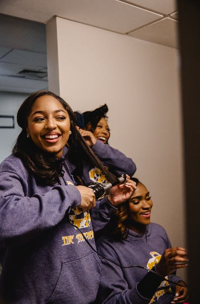 Girls doing their hair