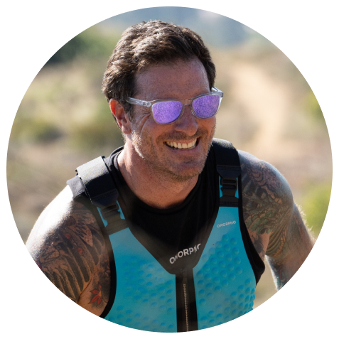 Close up of Seamus Mullen in omorpho vest hiking