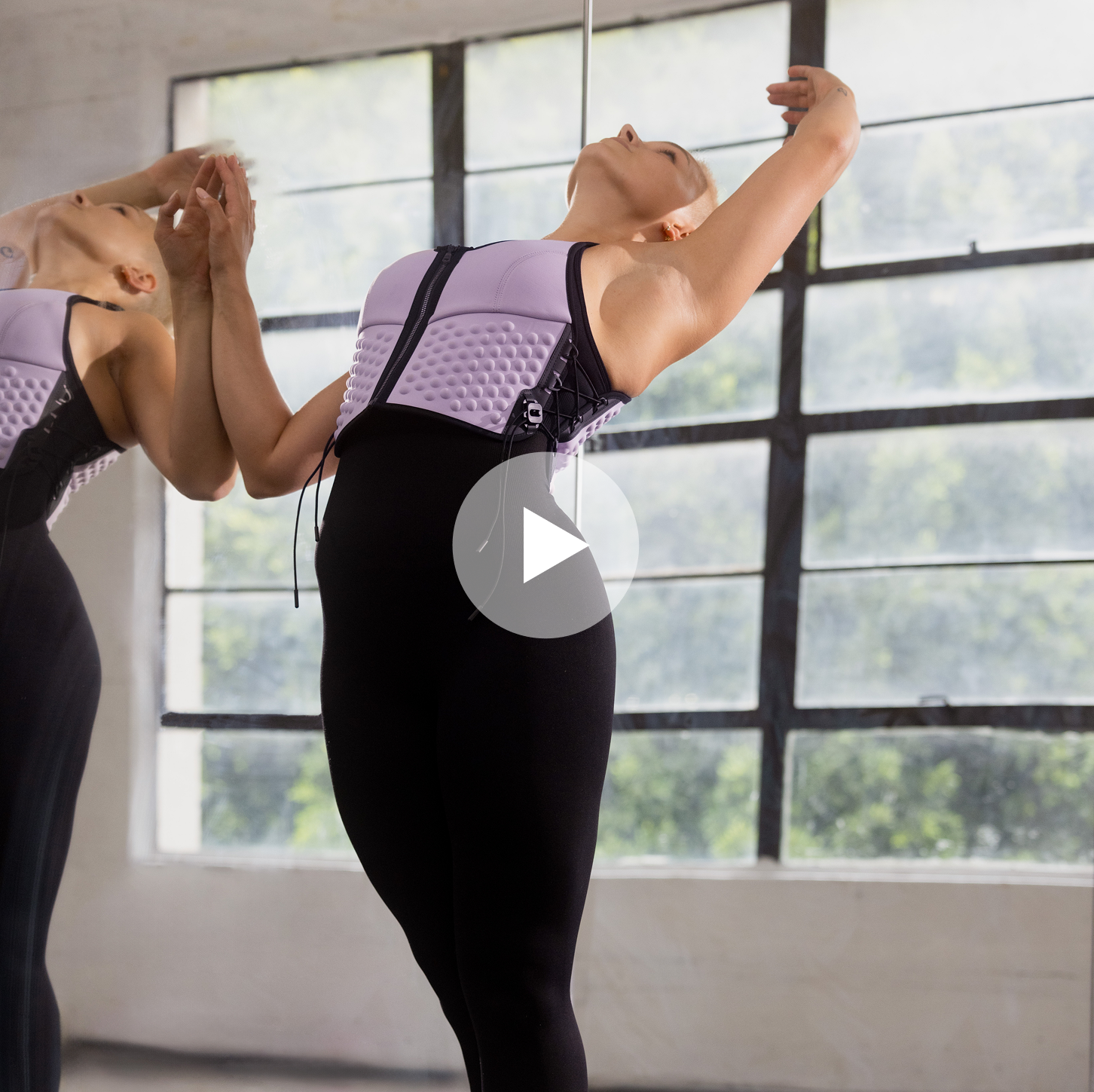 Tatyana Johnson in Omorpho Weighted G-Vest in a dance studio