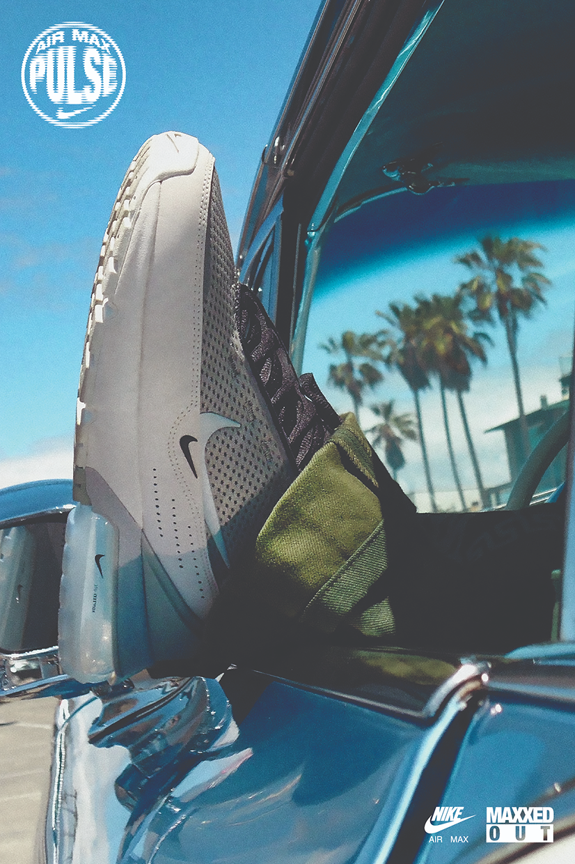 Nike Air Max shoe hanging from car window