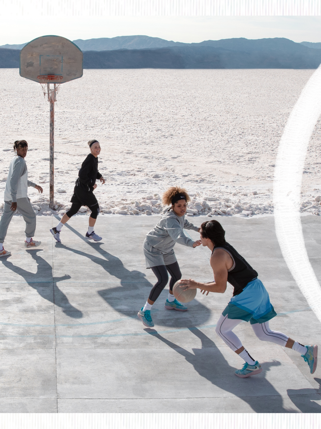 Group of people playing basketball