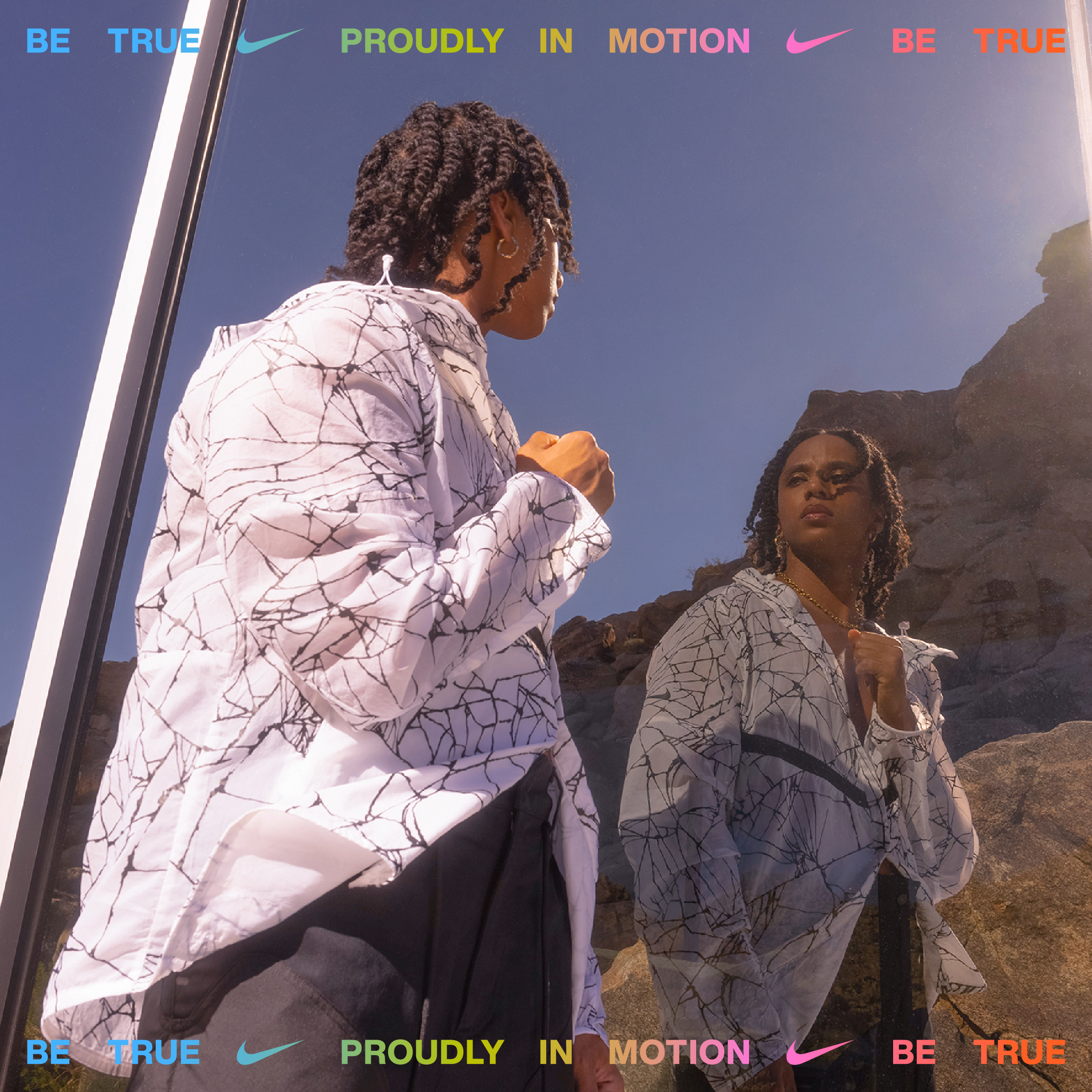 Janaya Khan looking at mirror