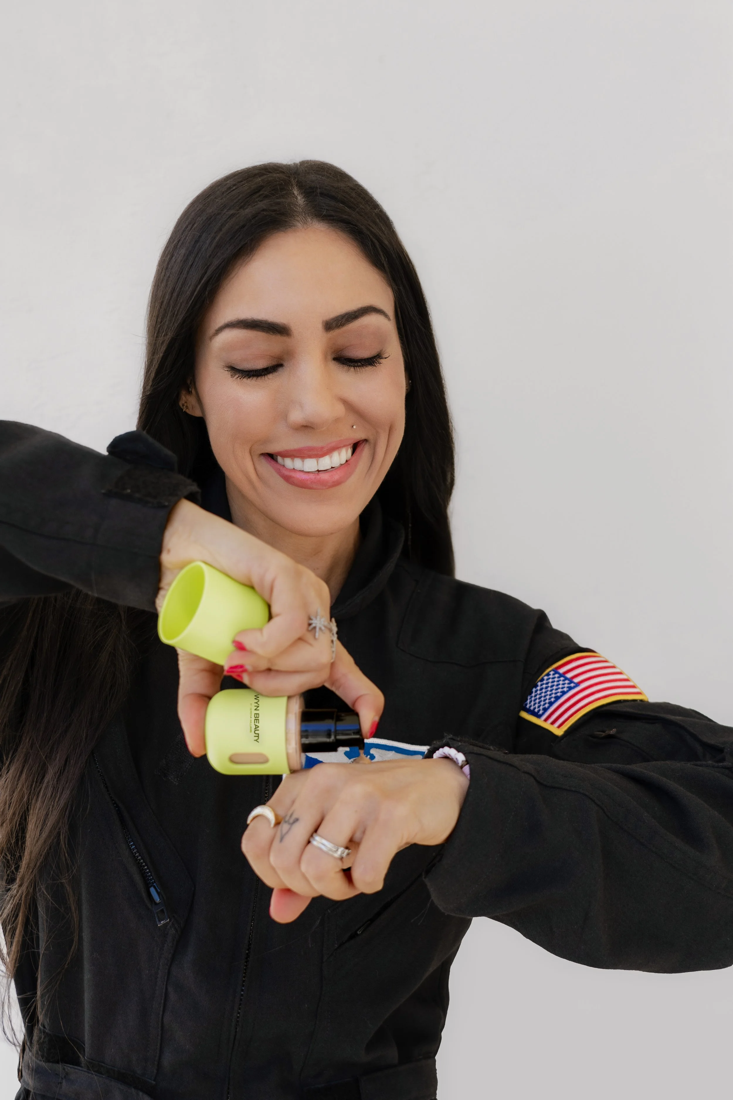 Kellie Gerardi trying Wyn Beauty Product