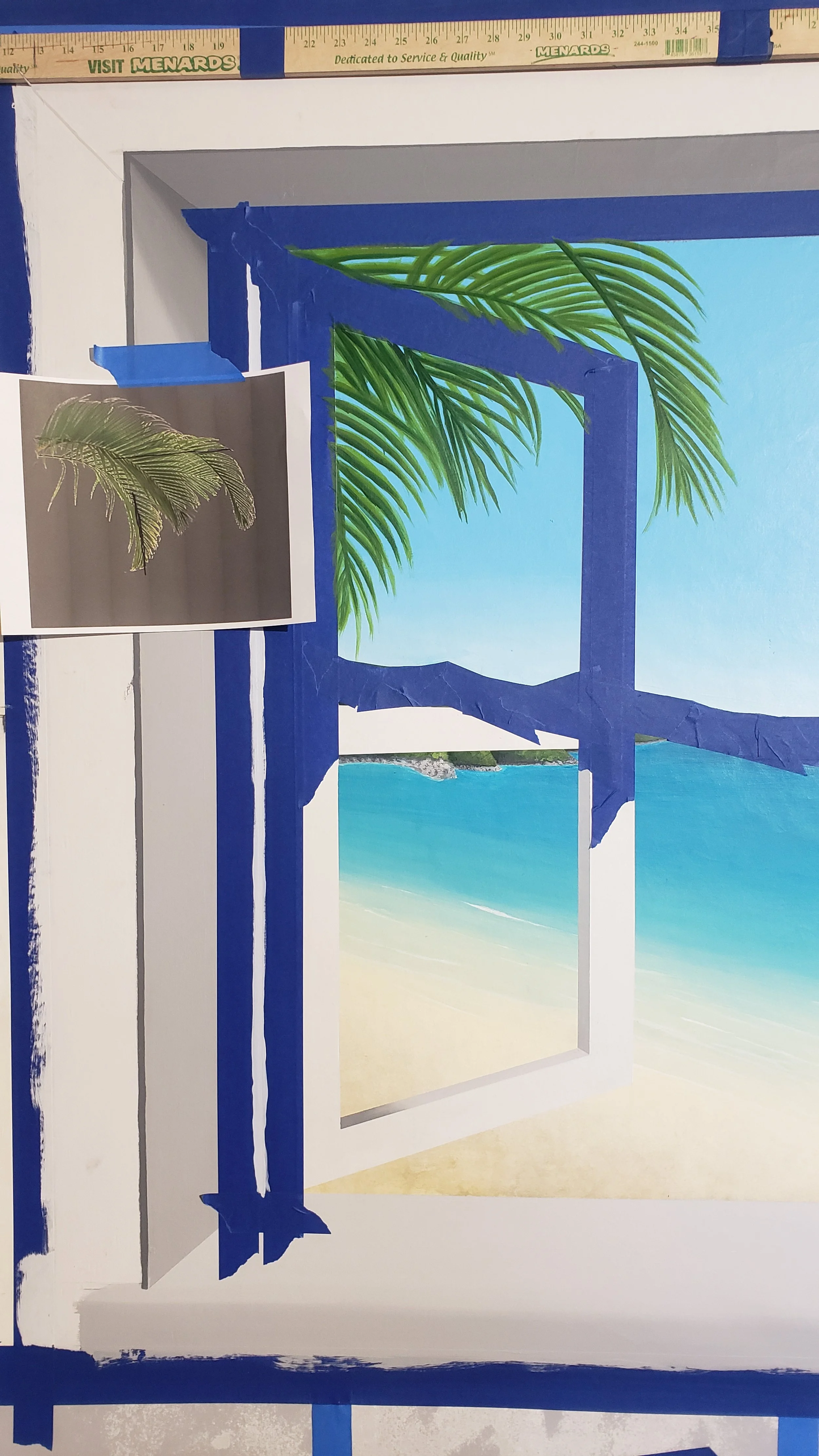 The final step was to add the palm fronds and shadows. I taped off the windows and frames again and then painted the palm fronds over the tape to make sure they lined up as I wanted them to. The next images are the final shots, the same ones I used f