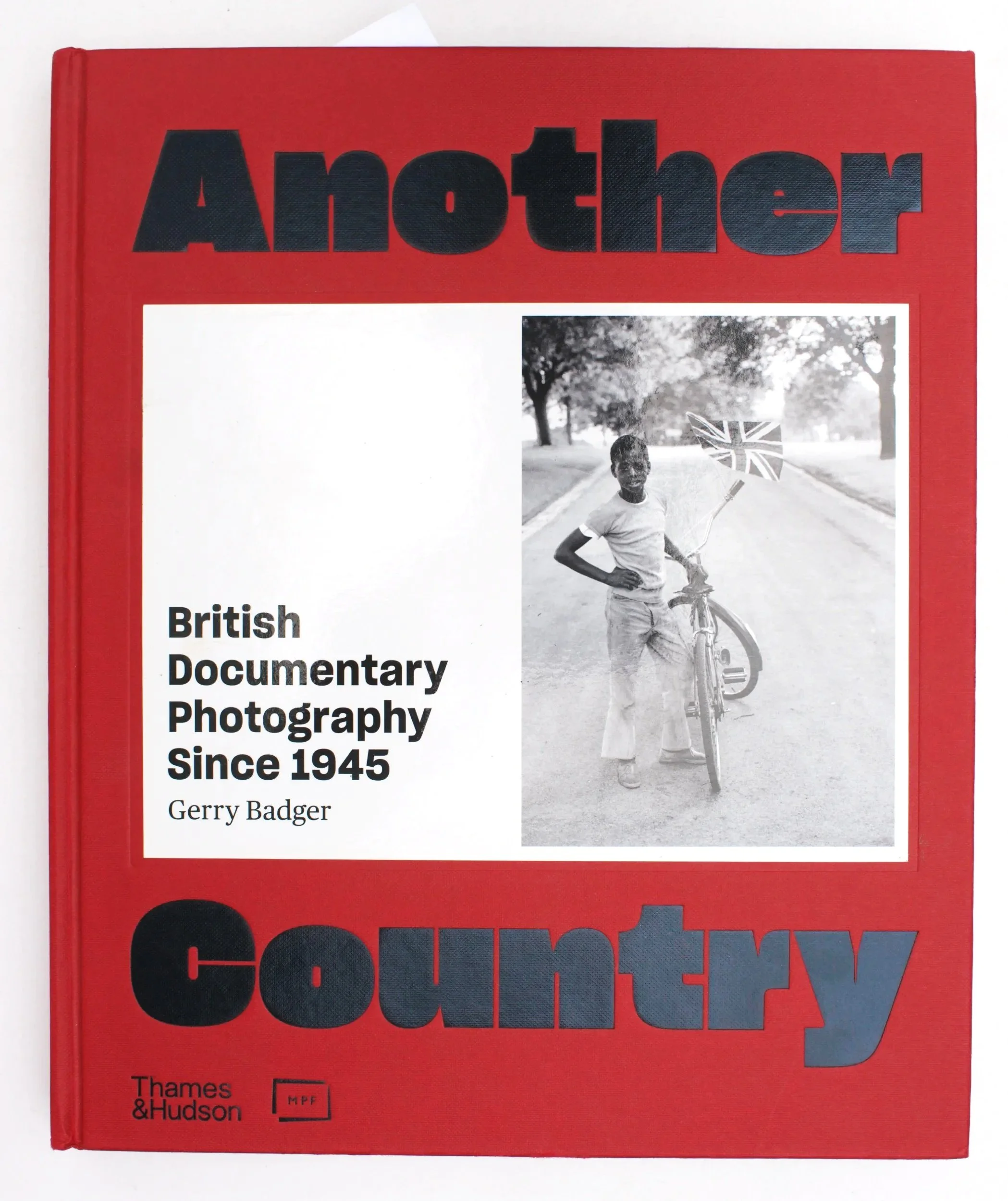 Published by Thames and Hudson and the Martin Parr Foundation in 2022. Another Country: British Documentary Photography Since 1945 by Gerry Badger 

