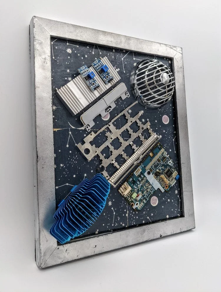 Art piece featuring electronic components on starry background