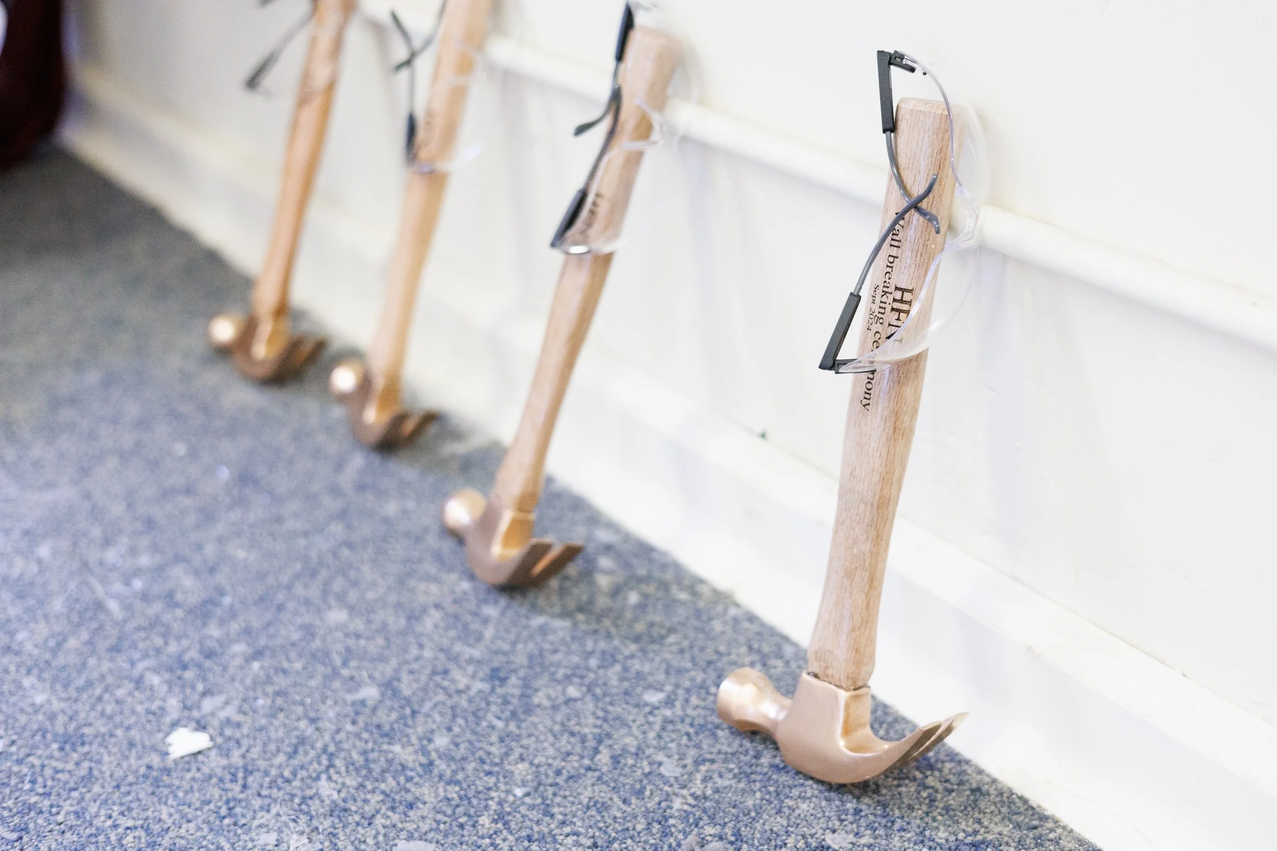 Golden Hammers ready for the 
ceremonial wall breaking