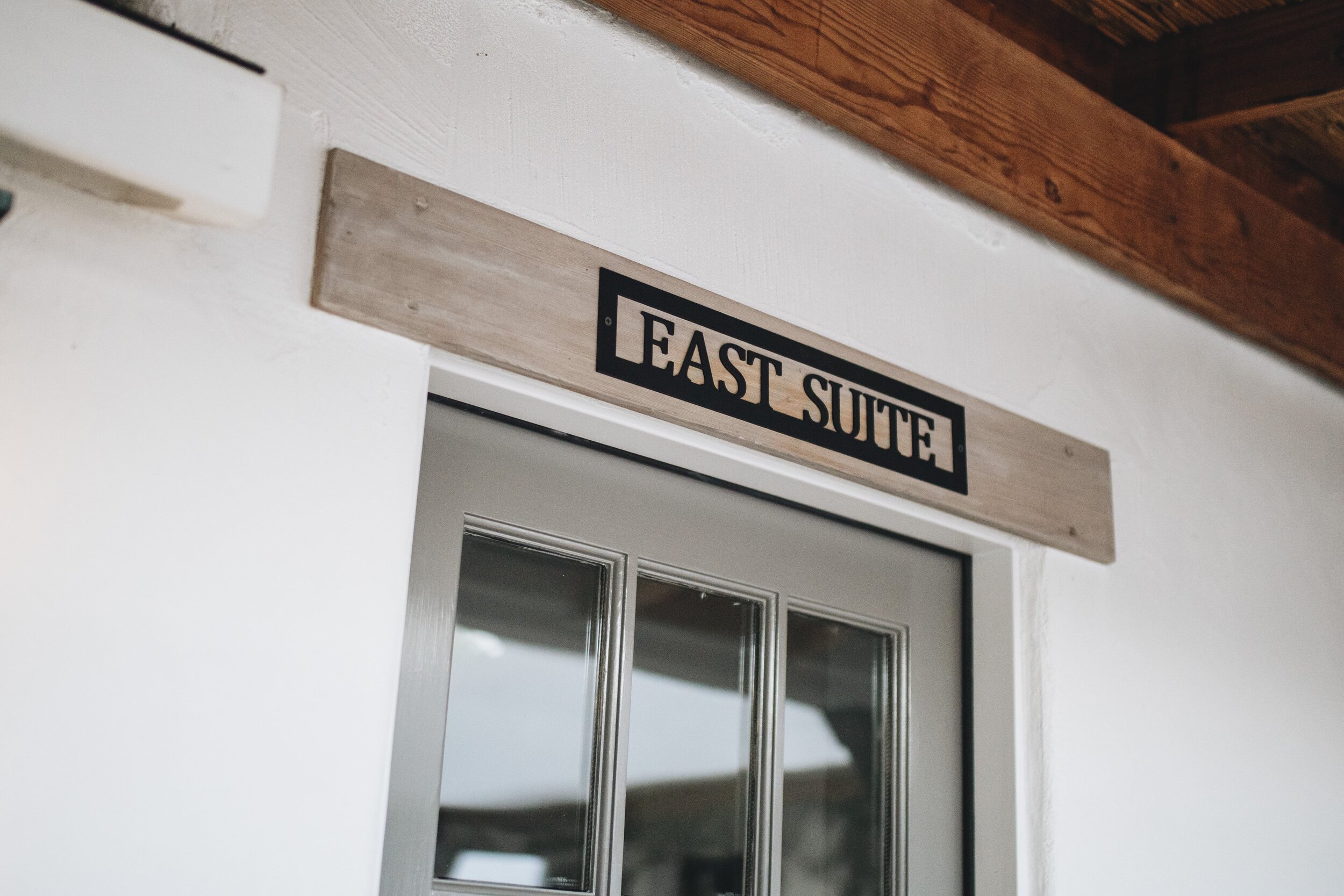  East Suite Sign