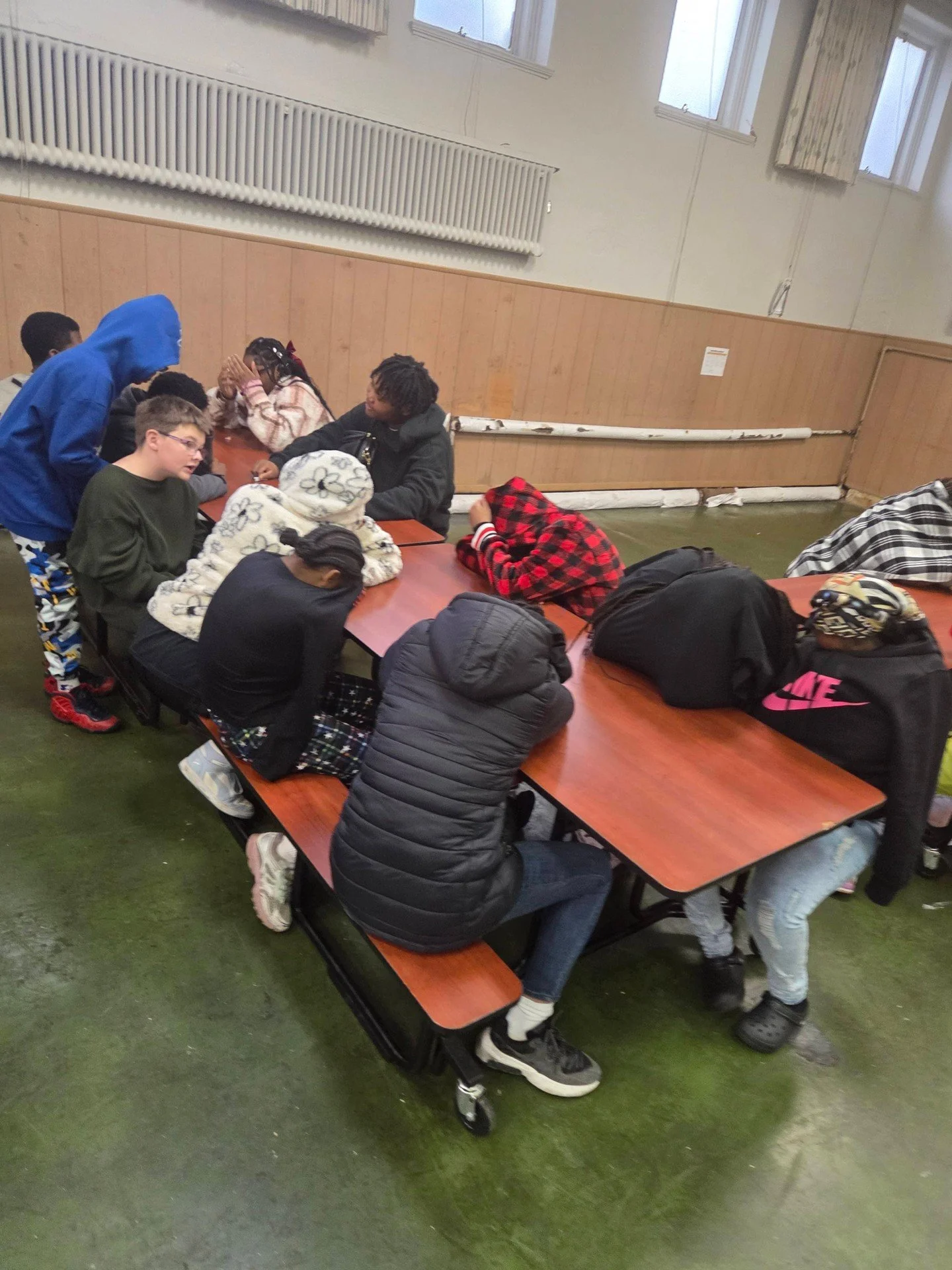 Middle School celebrated &quot;Friendsgiving&quot; with a tasty meal and a heartfelt speech.  Just when the special moment was about to be captured on camera.... all heads down!!😂😂
East Preparatory Academy building minds and  character!