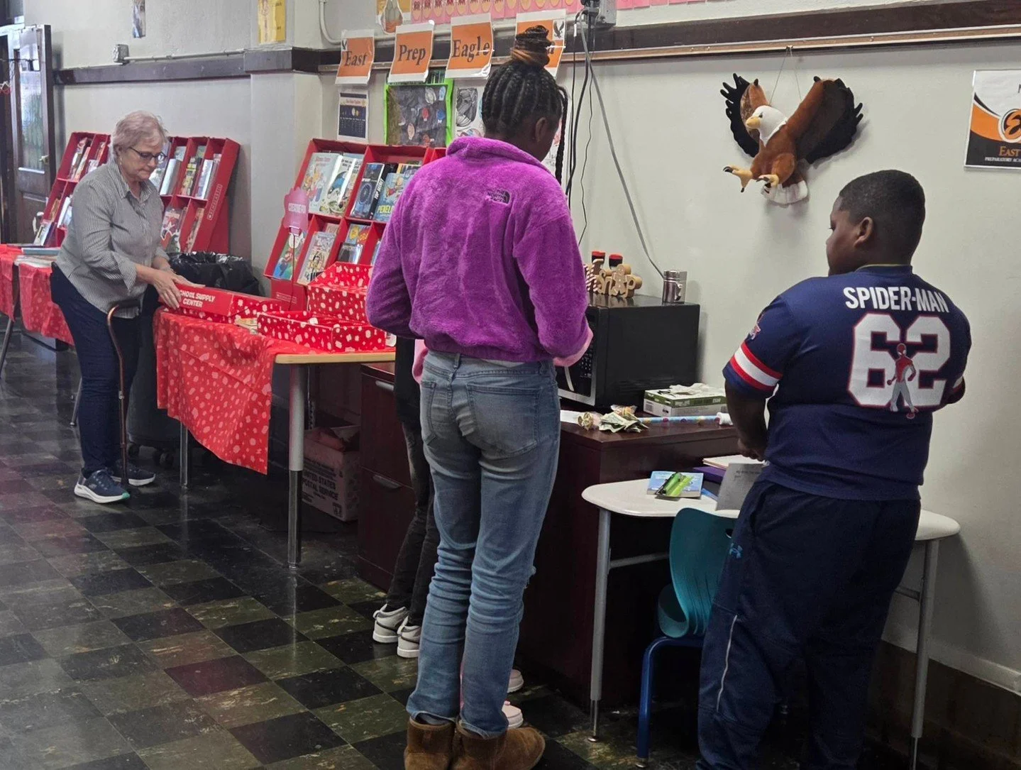 East Preparatory Academy students shows their love for  reading  as they make purchases at the Scholastic Book Fair!