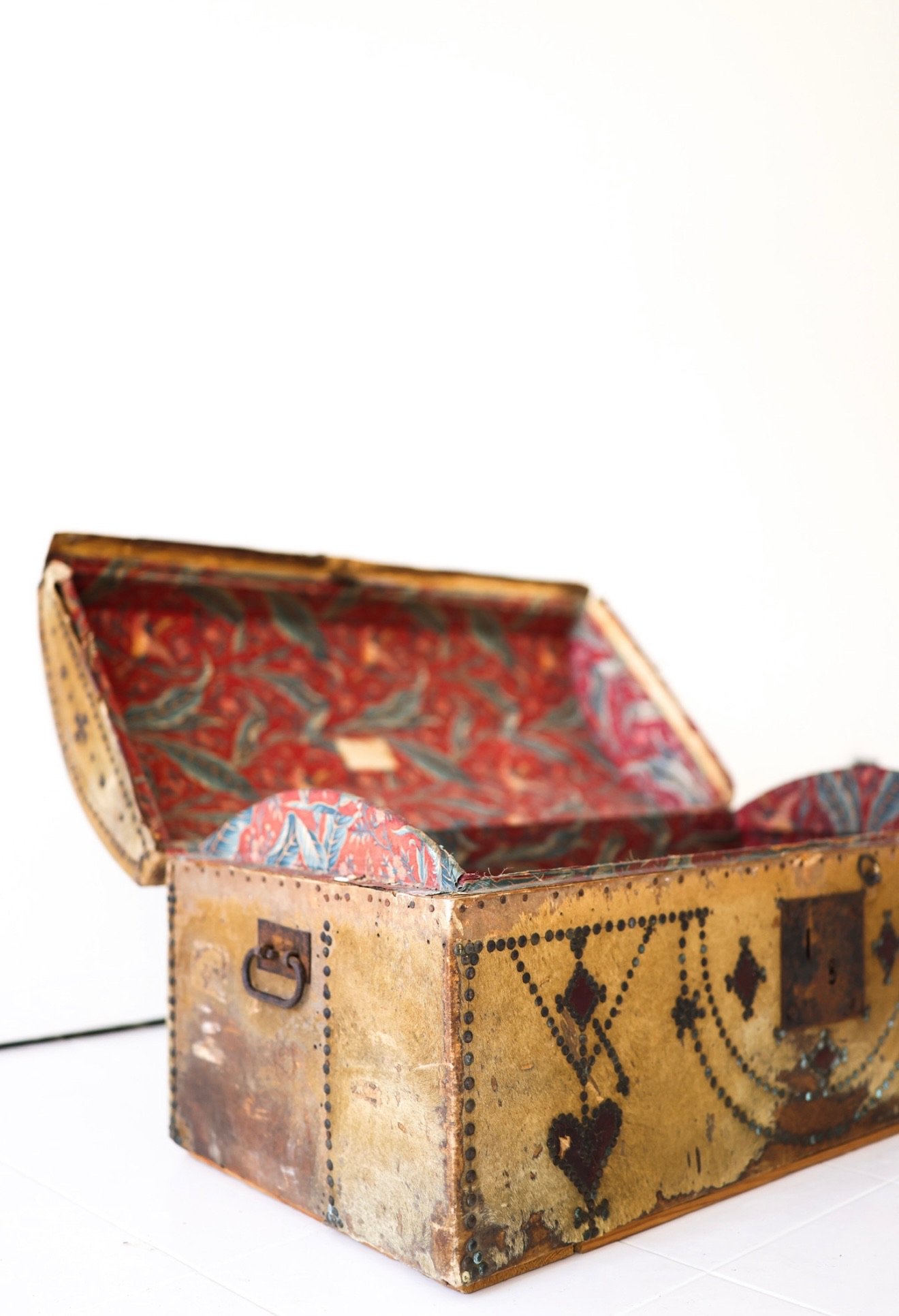 ANTIQUE TRUNK; HORSE HAIR AND NAIL HEAD TRIM