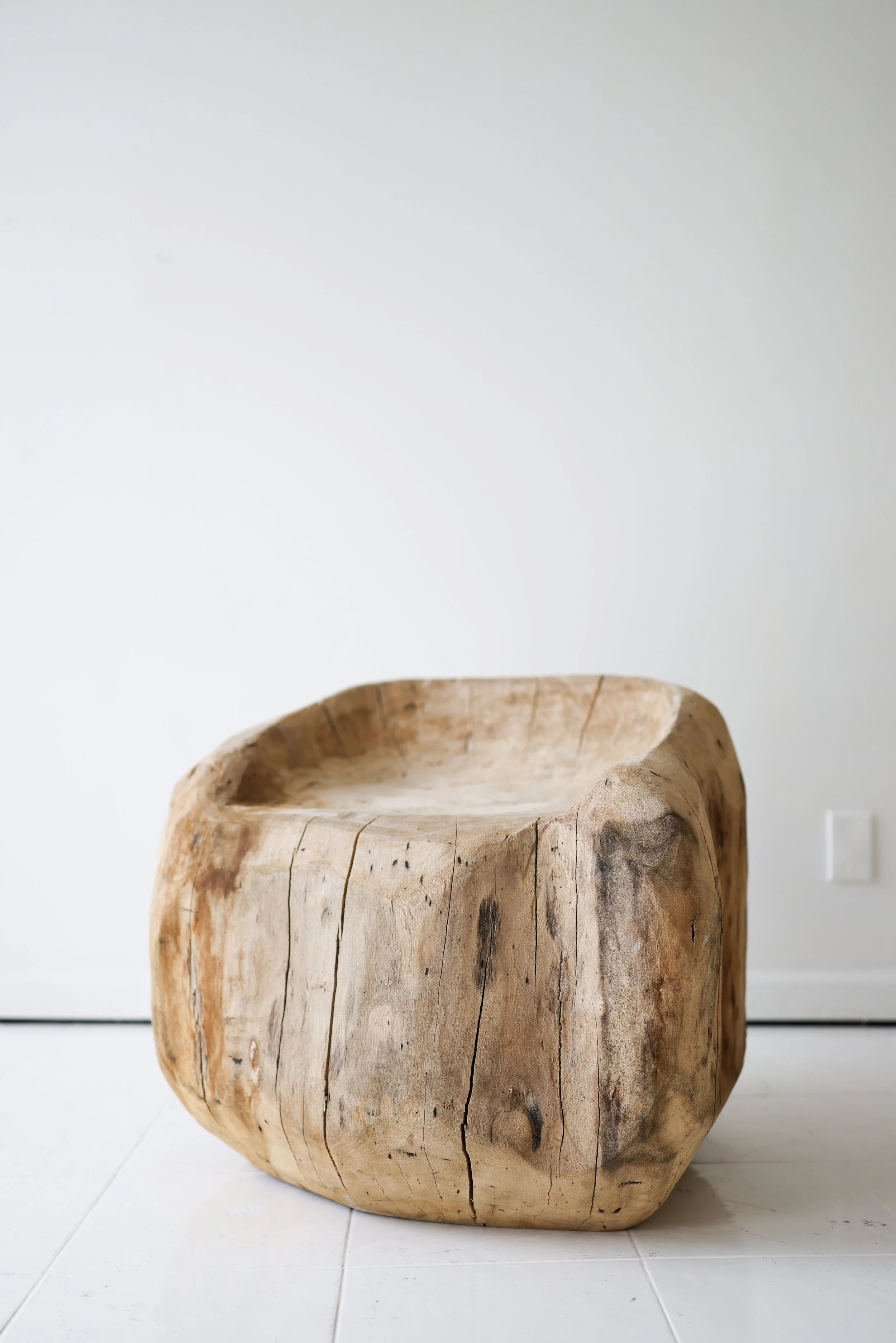 HAND CARVED TRUNK CHAIR