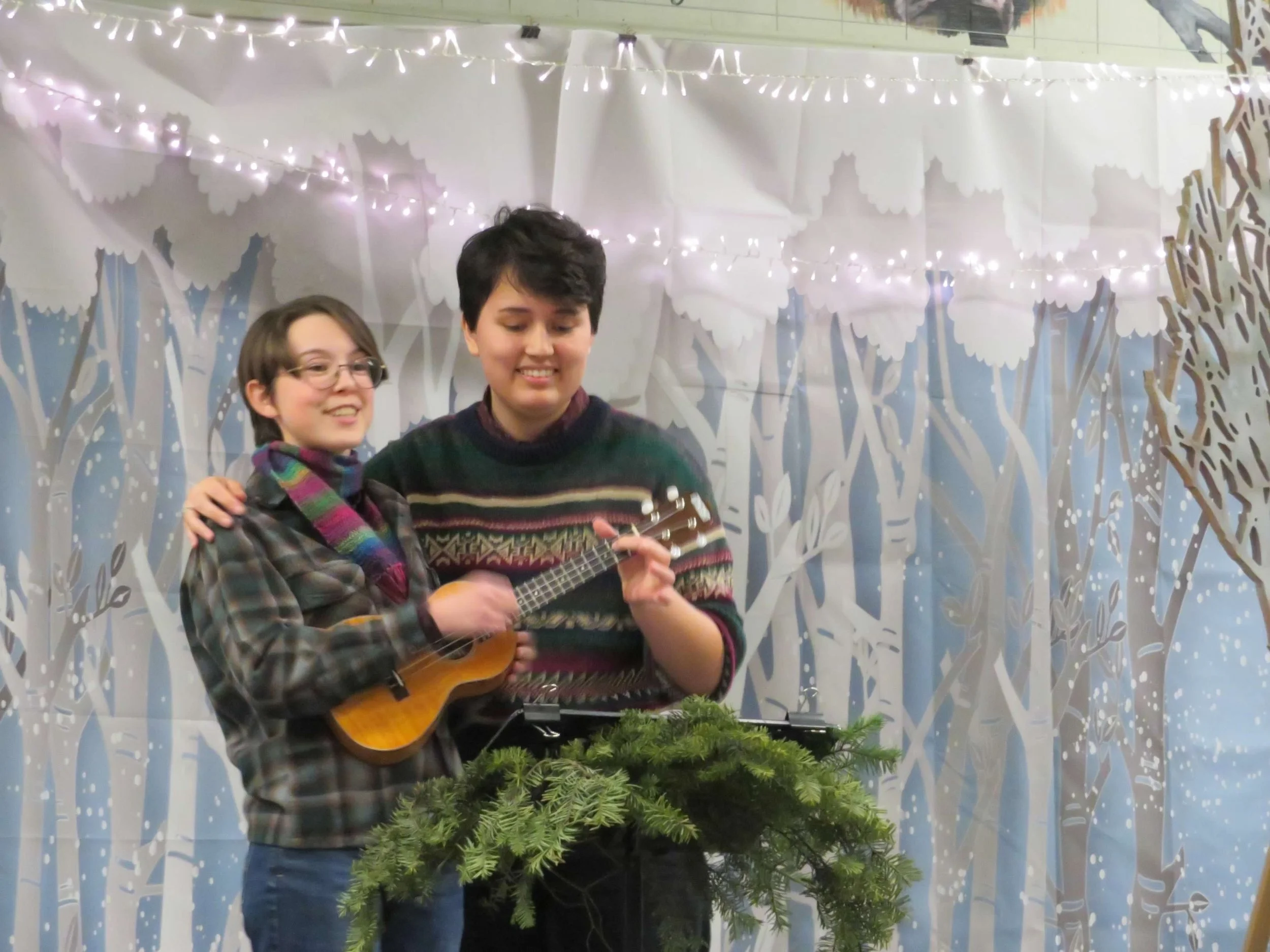 Syl Tavernise and Cassian Grove unwisely share a ukulele.