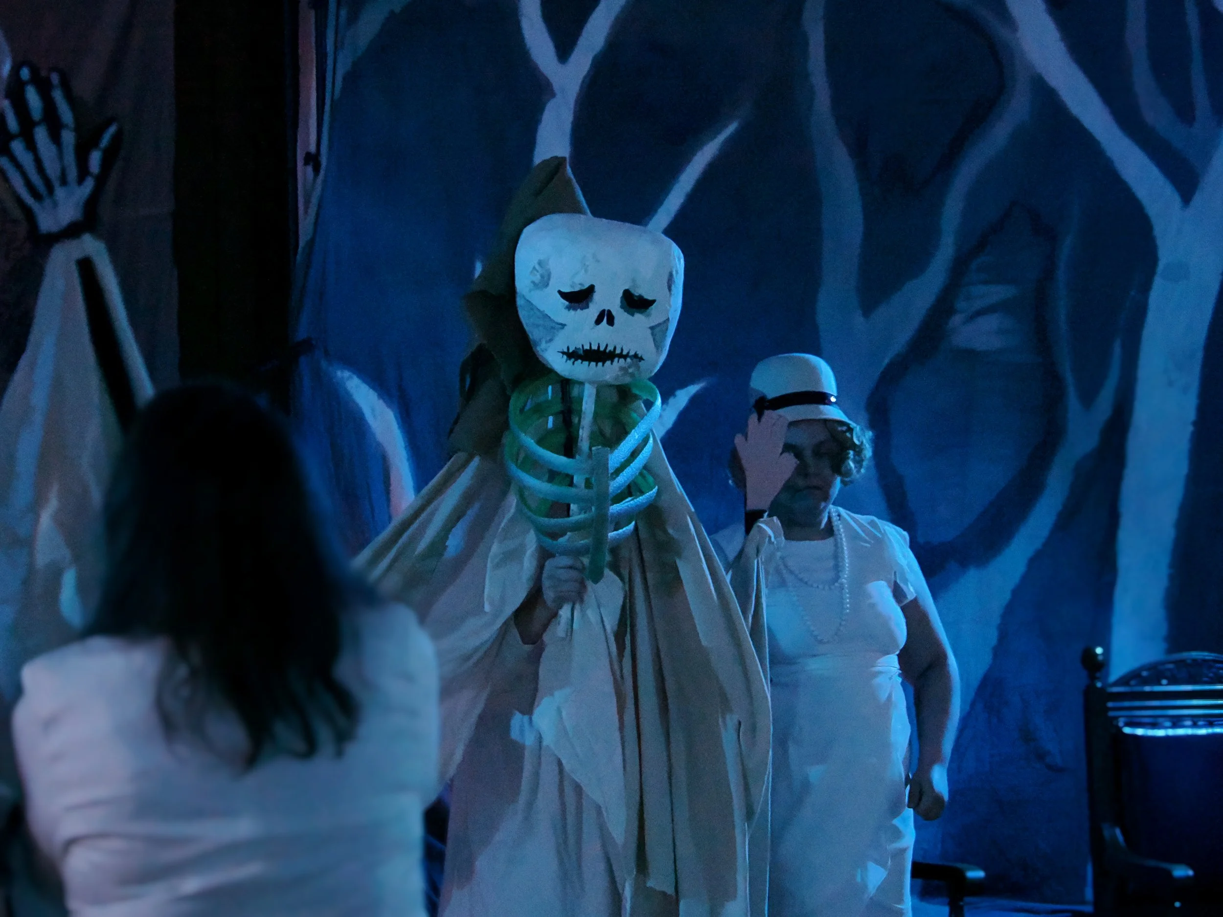 Eurydice, portrayed here by a puppet, turns hideous and decayed upon reaching the land of the living