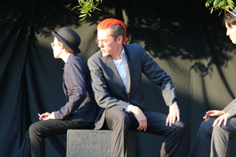 Two travelling salesmen (Left: Syl Tavernise,  right: Rory Kinsolving) discuss the current state of affairs.