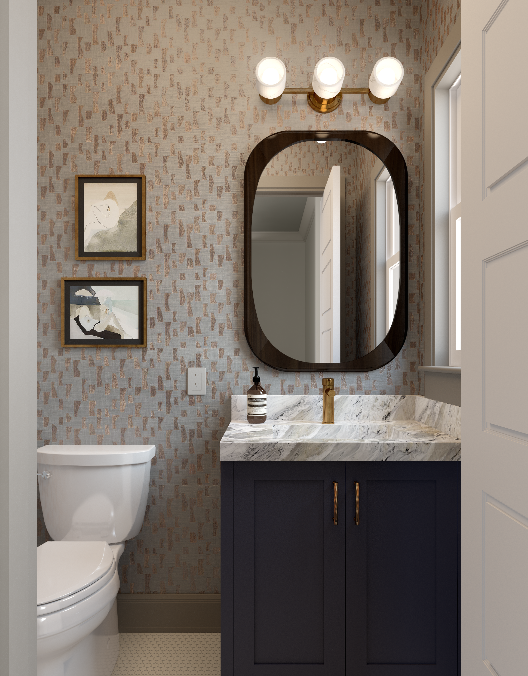 Small bathroom with a dark blue vanity, white marble countertop, and oval mirror. Wall with textured beige wallpaper, two framed abstract art pieces, window on the right, and modern light fixture with three bulbs overhead.