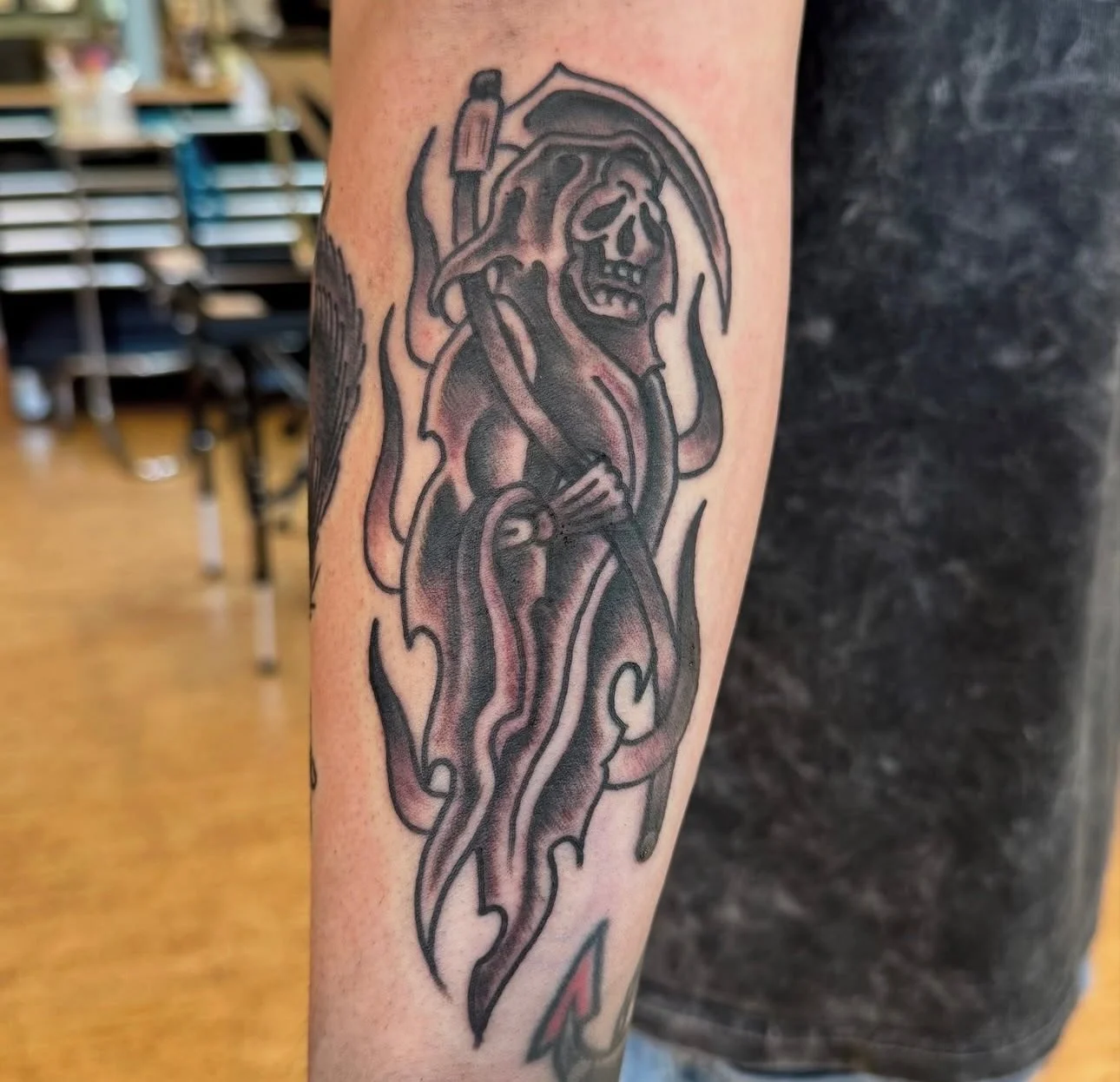 Classic reaper in black and grey done by @jakeacreetattoos 

Jake is in shop Thursdays through Mondays taking walk-ins and appointments. To schedule with Jake head over to his page and send him a DM.