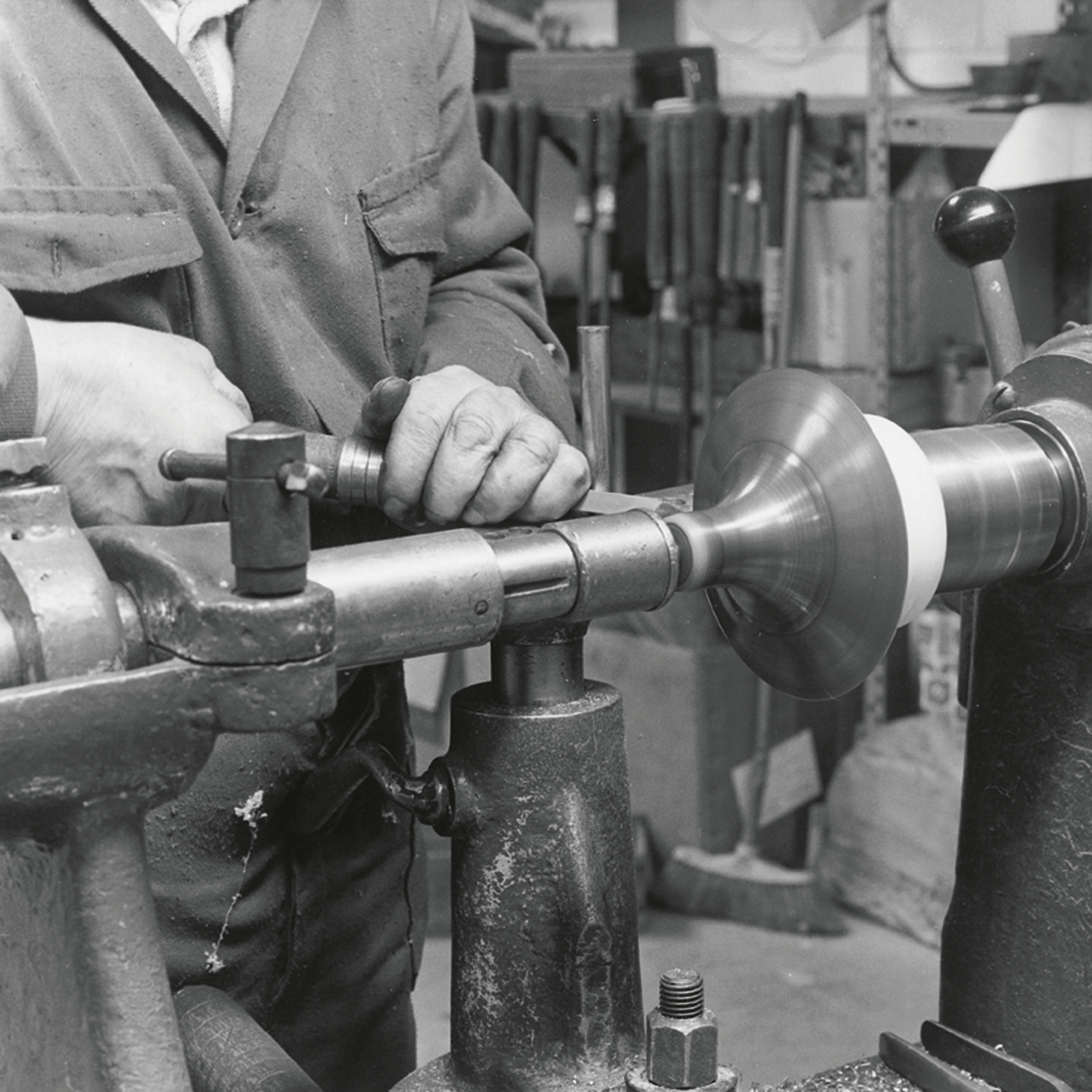 THROWING - Throwing, or metal turning, shapes metal sheets on a horizontal lathe using burnishing tools.The sheet is pressed against a rotating mandrel — typically made of bronze, wood, or nylon — to create symmetrical forms such as cylinders or sphe