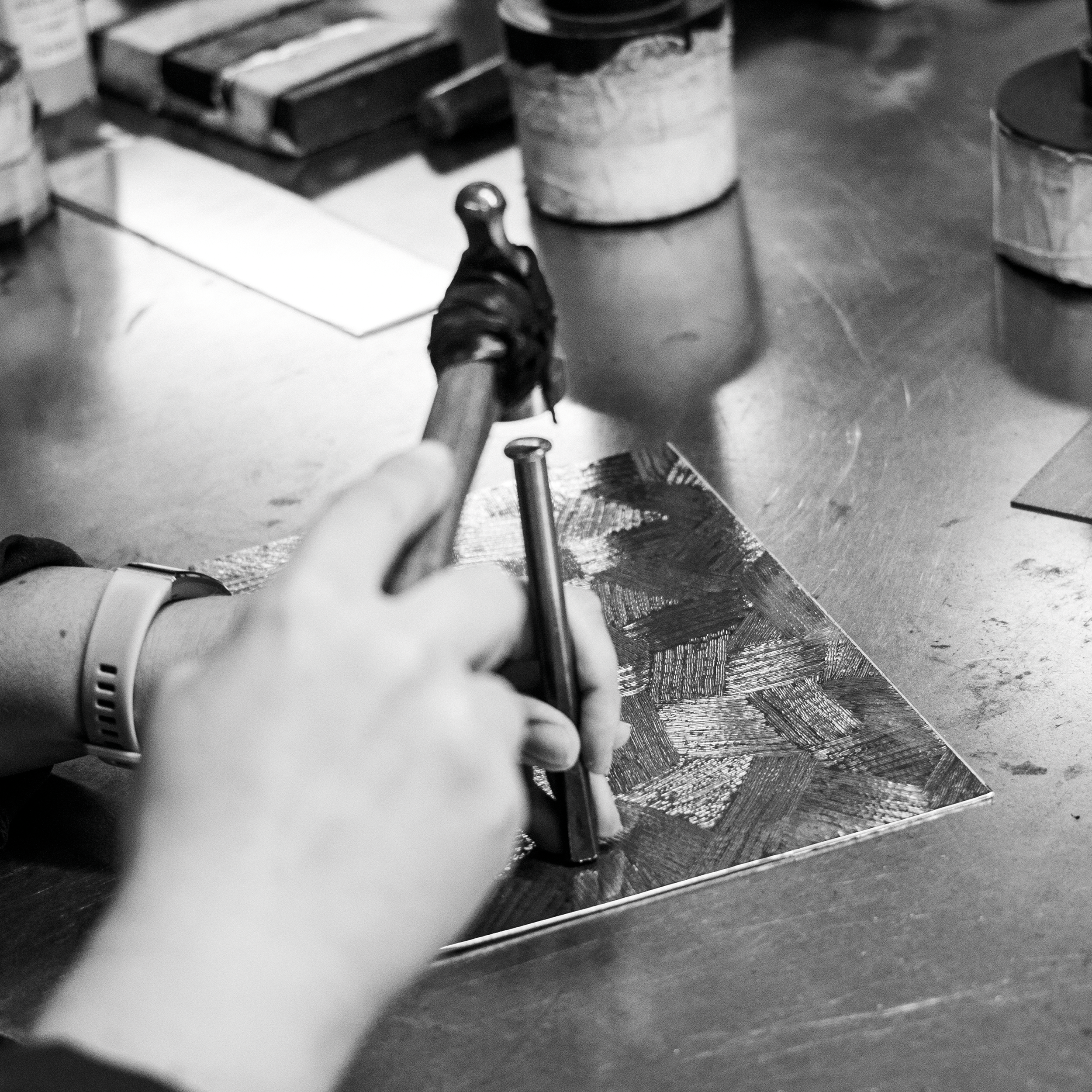 CHASING - Chasing is the art of decorating metal surfaces without removing material. Using small chisels and hammers, the craftsman embosses patterns, textures, or reliefs directly onto the piece. Each mark is deliberate, guided by both technical ski