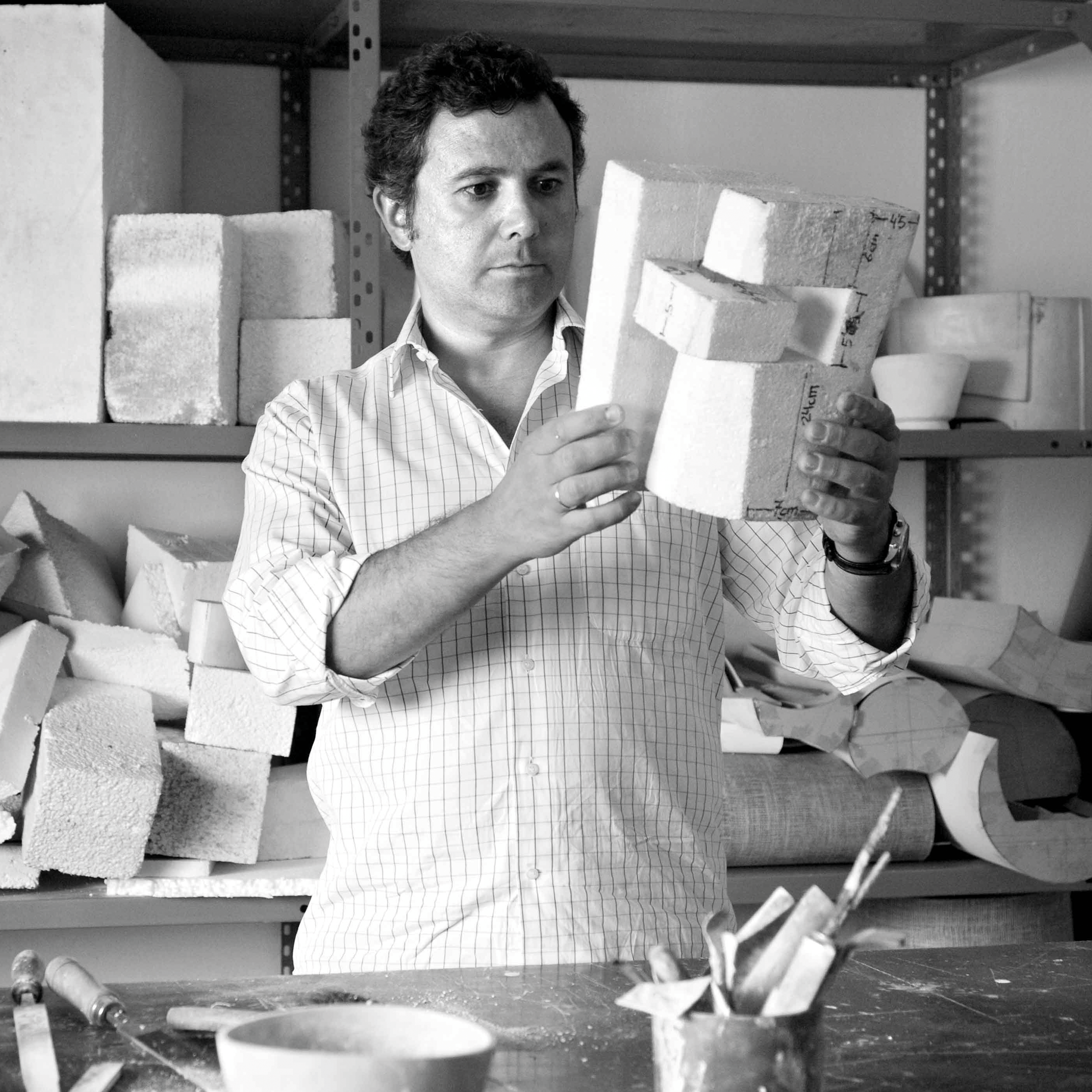 MODELING - Every piece begins with an idea translated into form through hand modeling. Using cork, cardboard, or wax, the artisan creates a three-dimensional prototype that defines proportion, balance, and volume before the metalwork begins.This stag