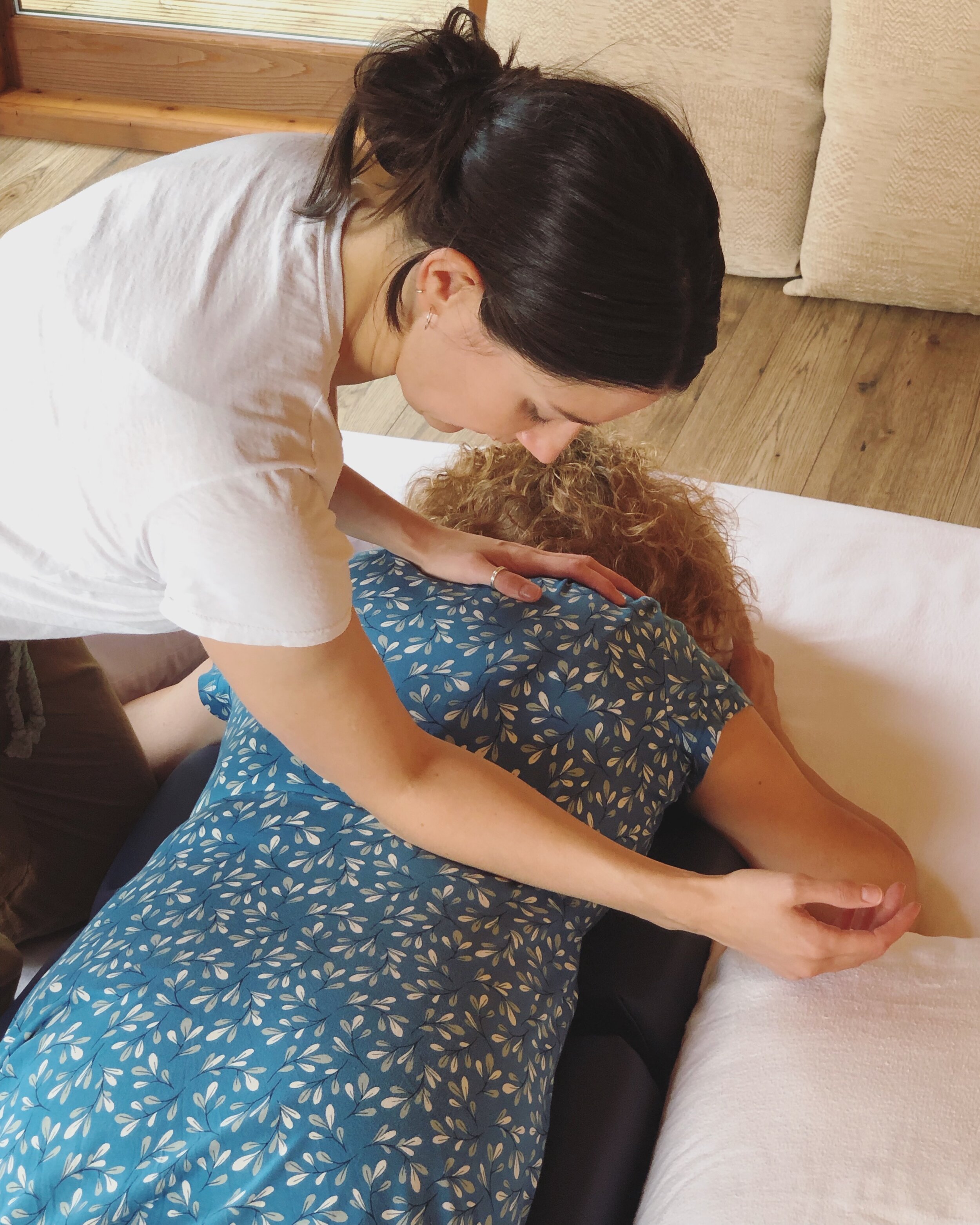 Treating the deep erector spinae muscles with elbow pressure. Bladder and Kidney Meridians of the water channels.