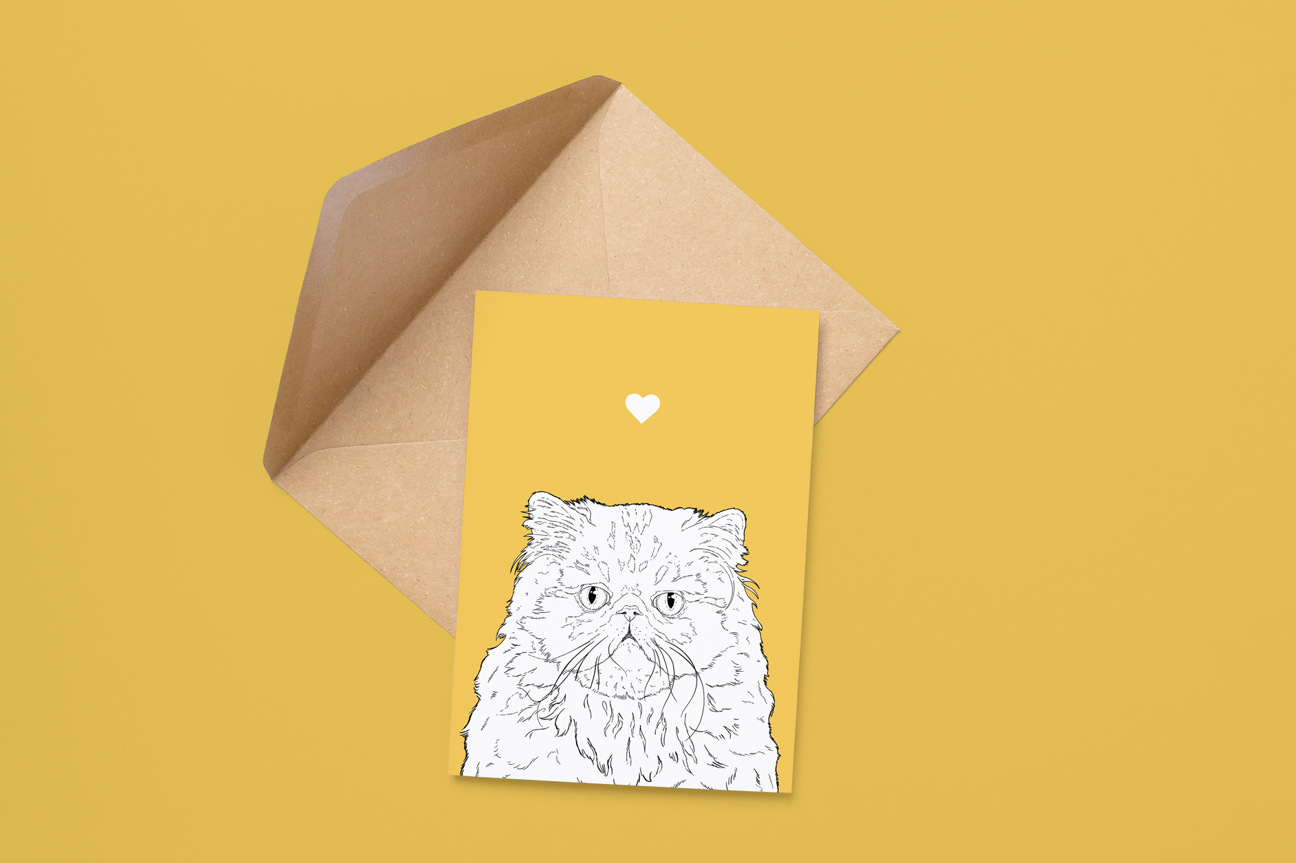 An A6 greetings card on a brown envelope. The card & image have a yellow orange background, with a black & white digital illustration of the head & shoulders of a Persian cat.