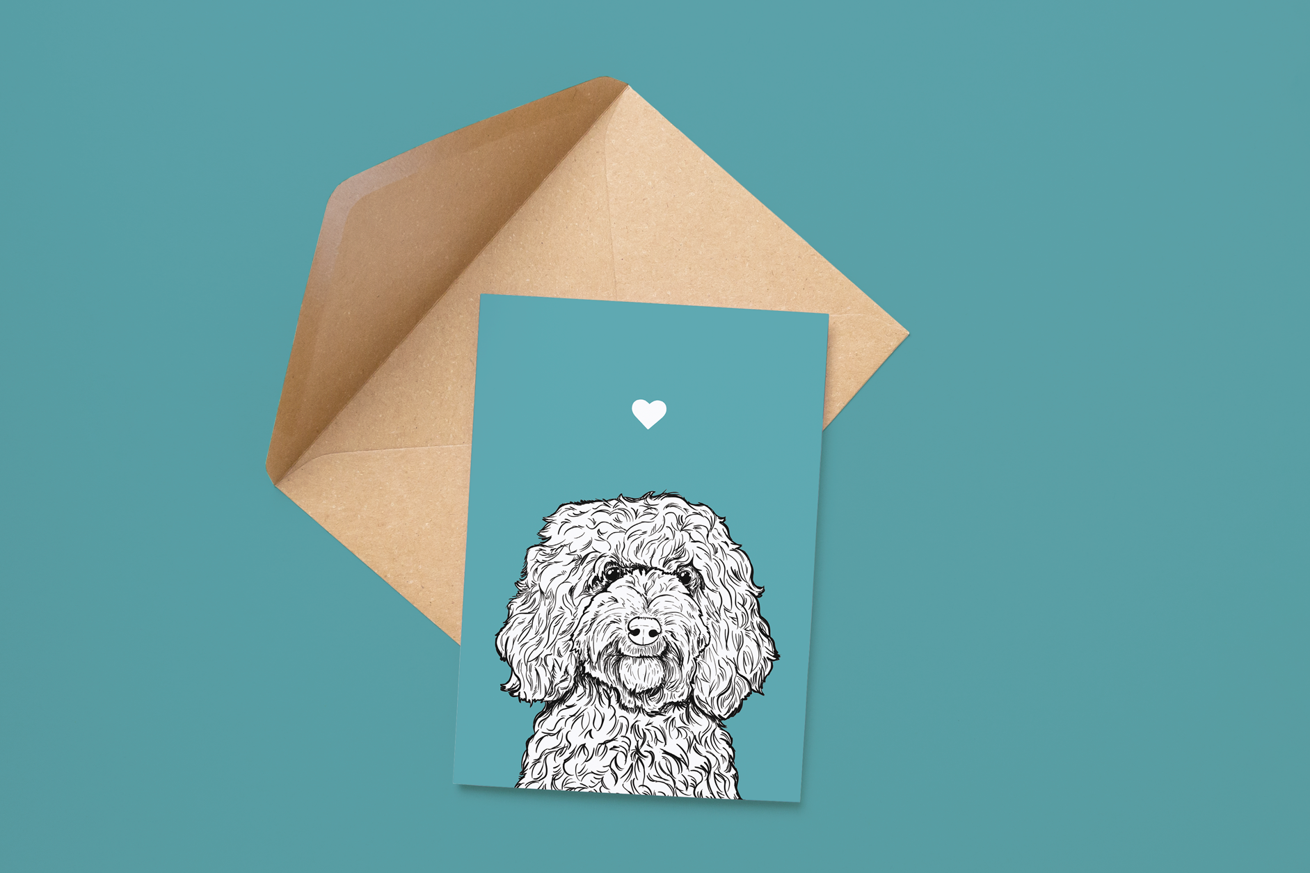 An A6 greetings card on a brown envelope. The card & image have a turquoise background, with a black & white digital illustration of the head & shoulders of a Cockapoo dog.