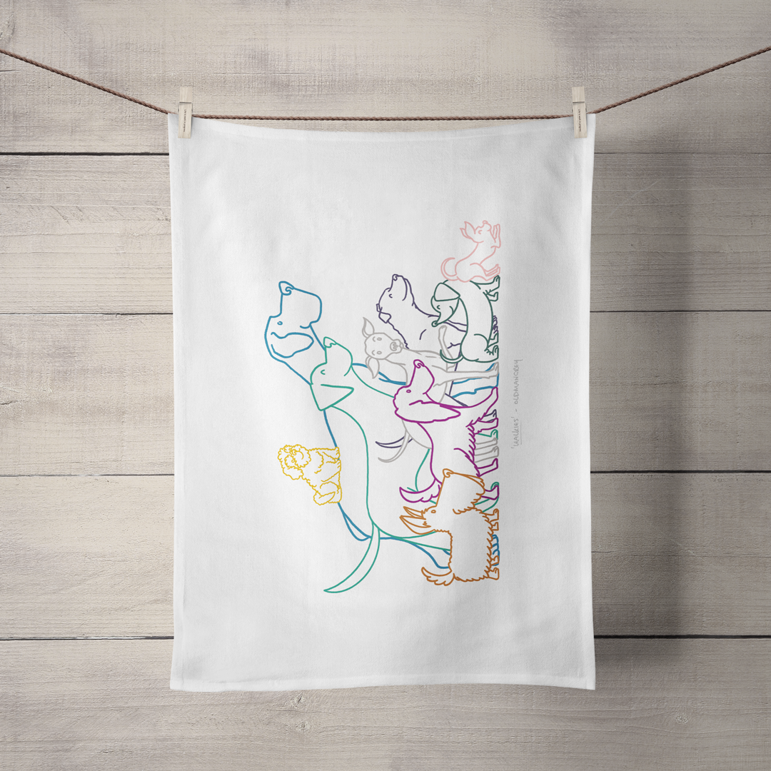 A large tea towel hanging by its short side from a piece of string. It has a colourful digital illustration of 9 different dog breeds, all eager for walkies.